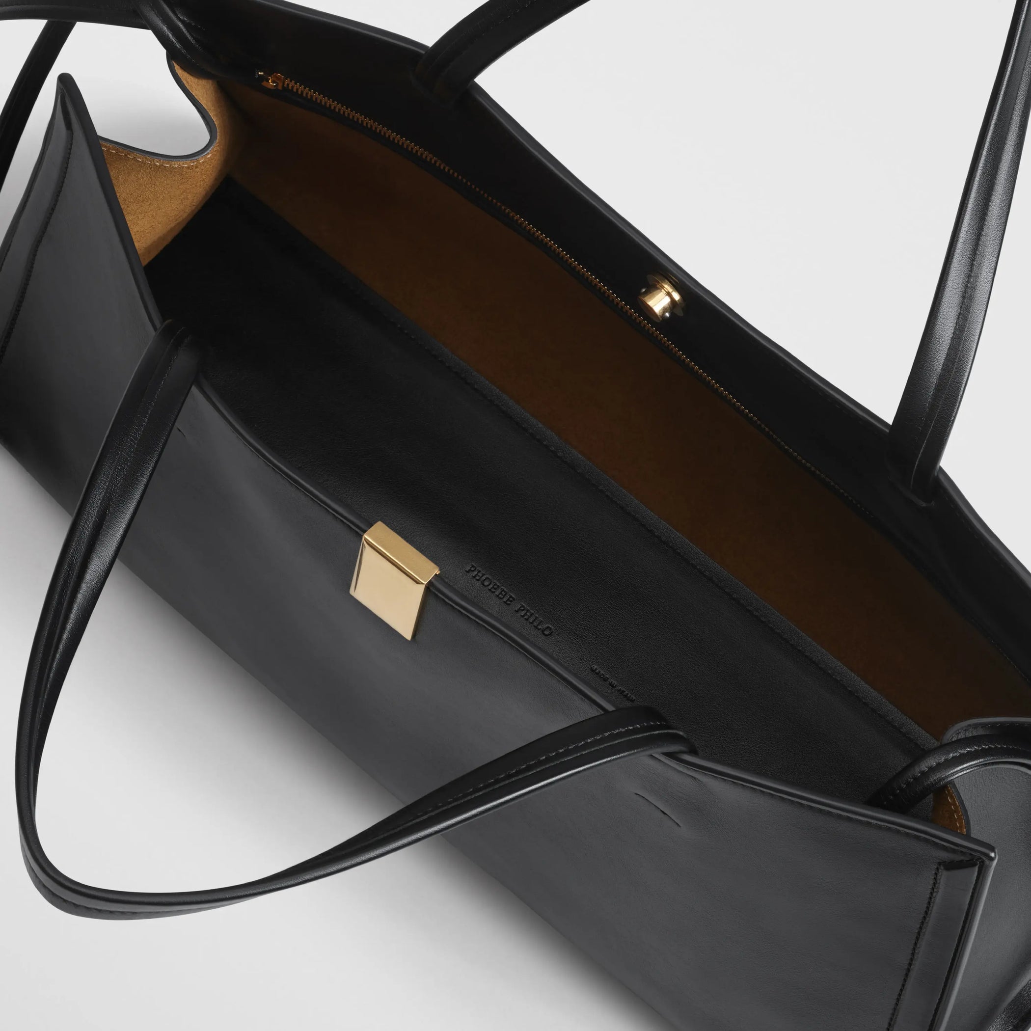 Detailed view of Small Kit Cabas in black.
