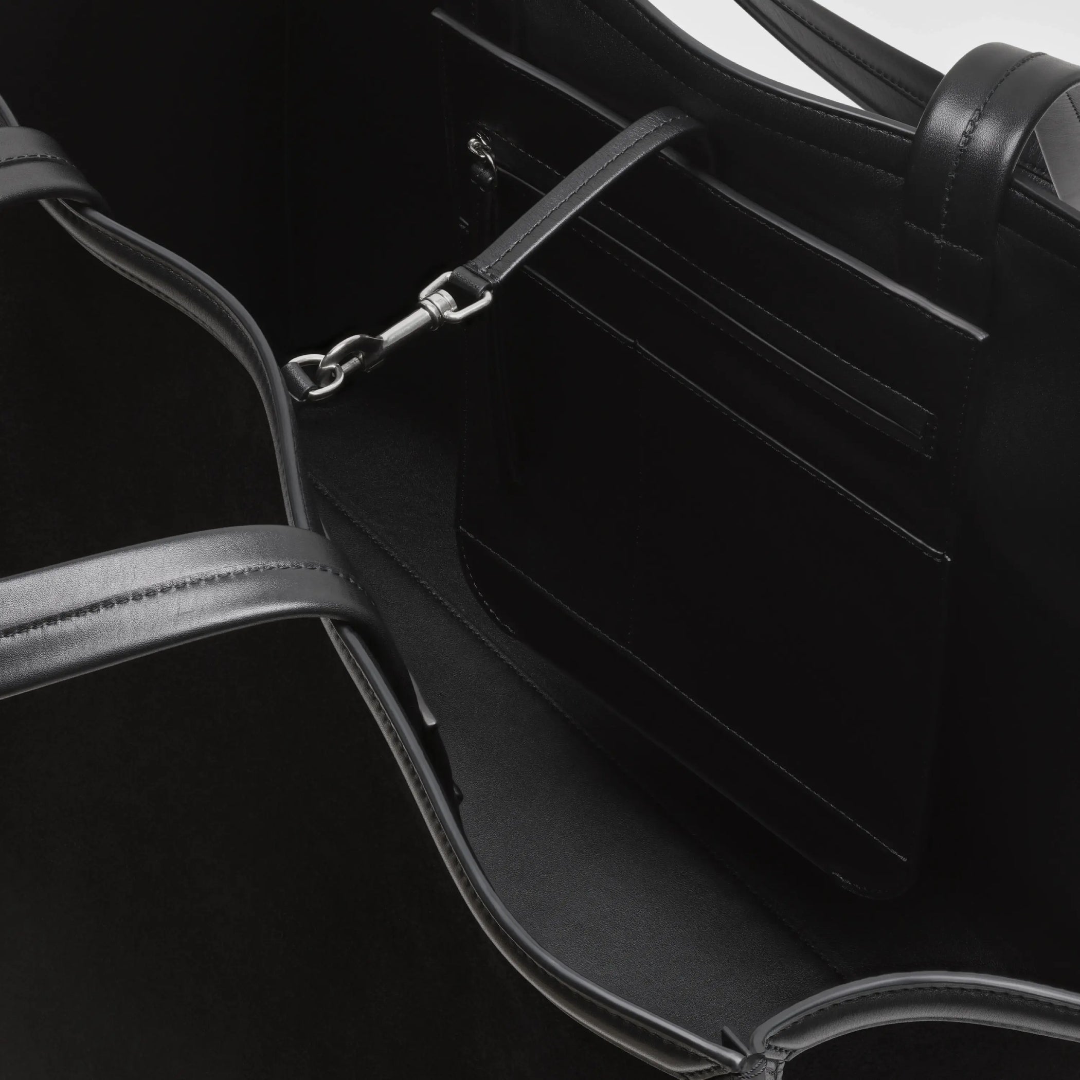 detail view of XL cabas in black suede