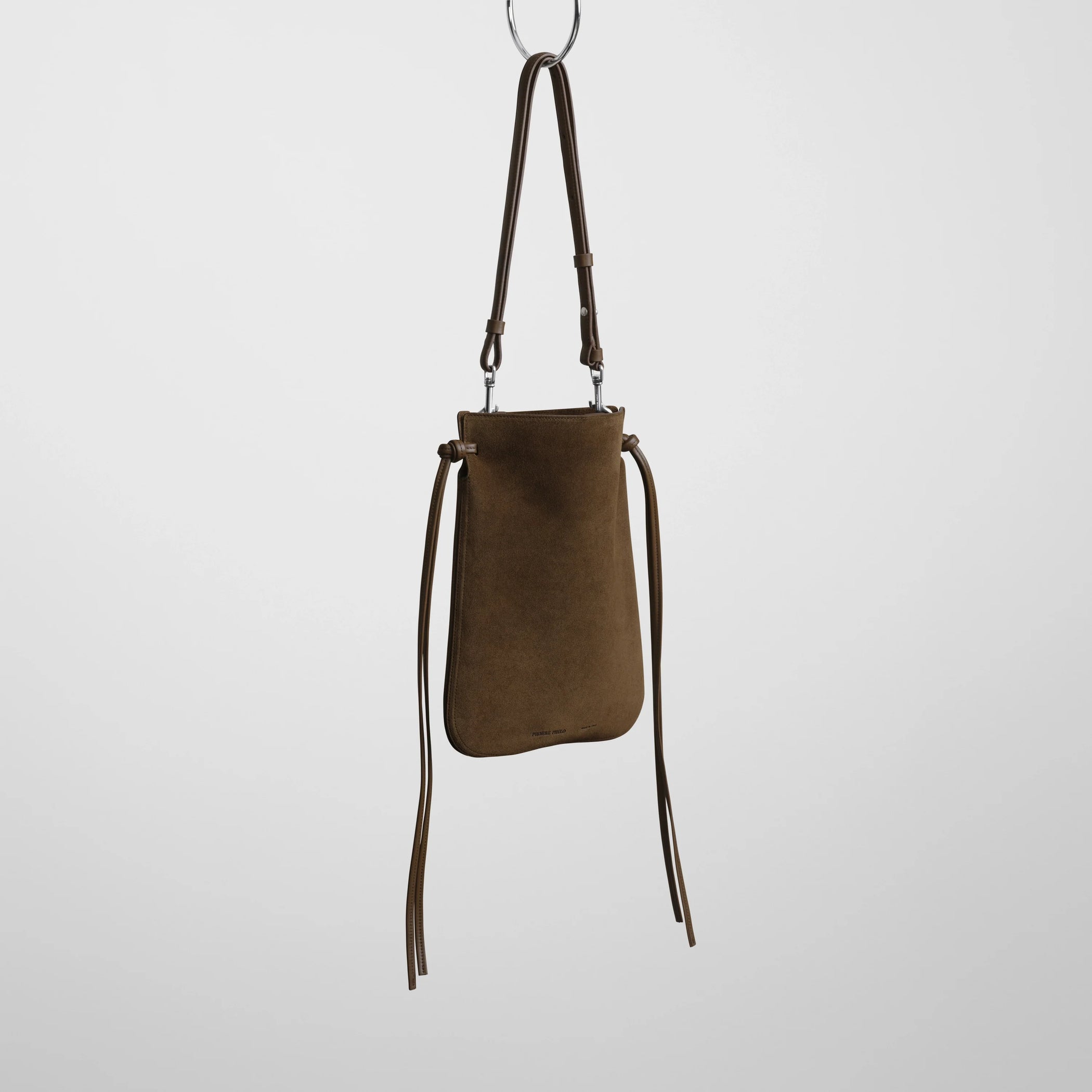 Angled front view of gig pouch in khaki leather