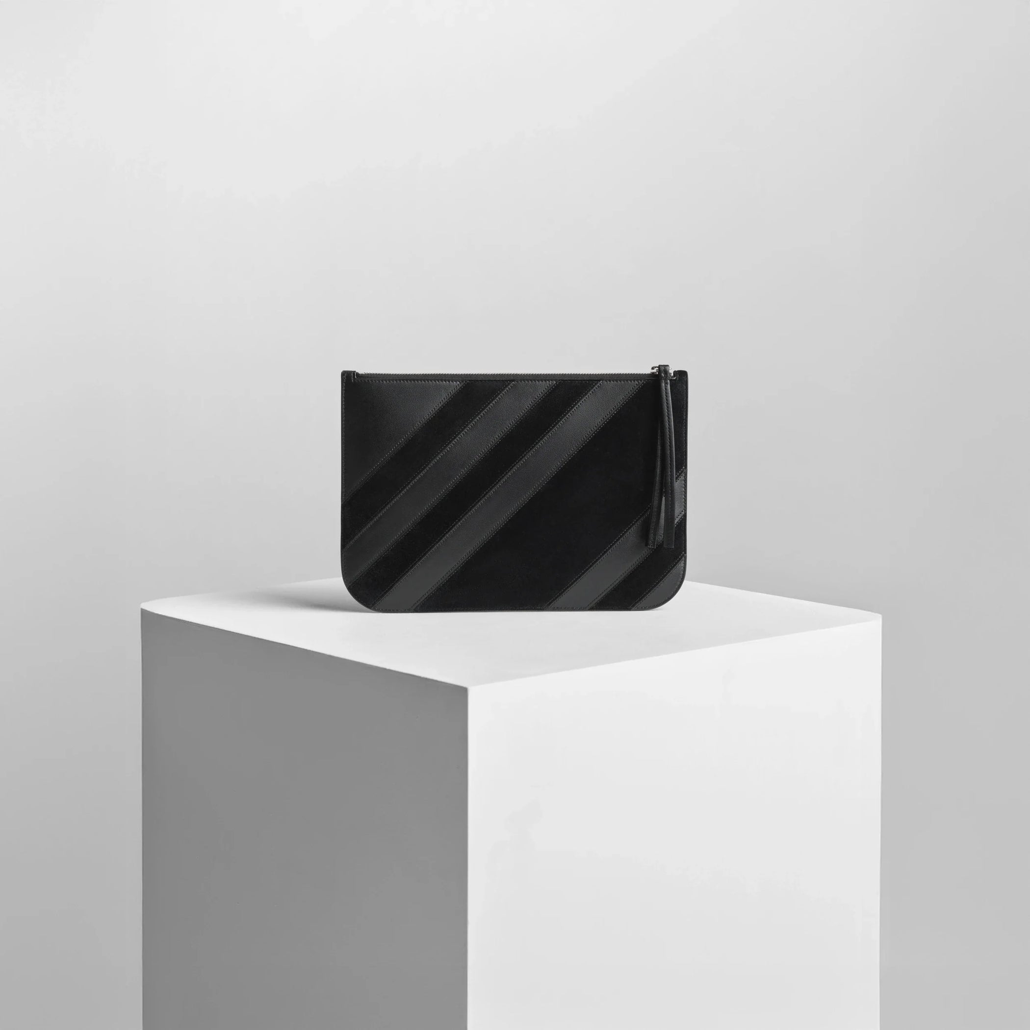 Back view of pocket pouch in black leather.