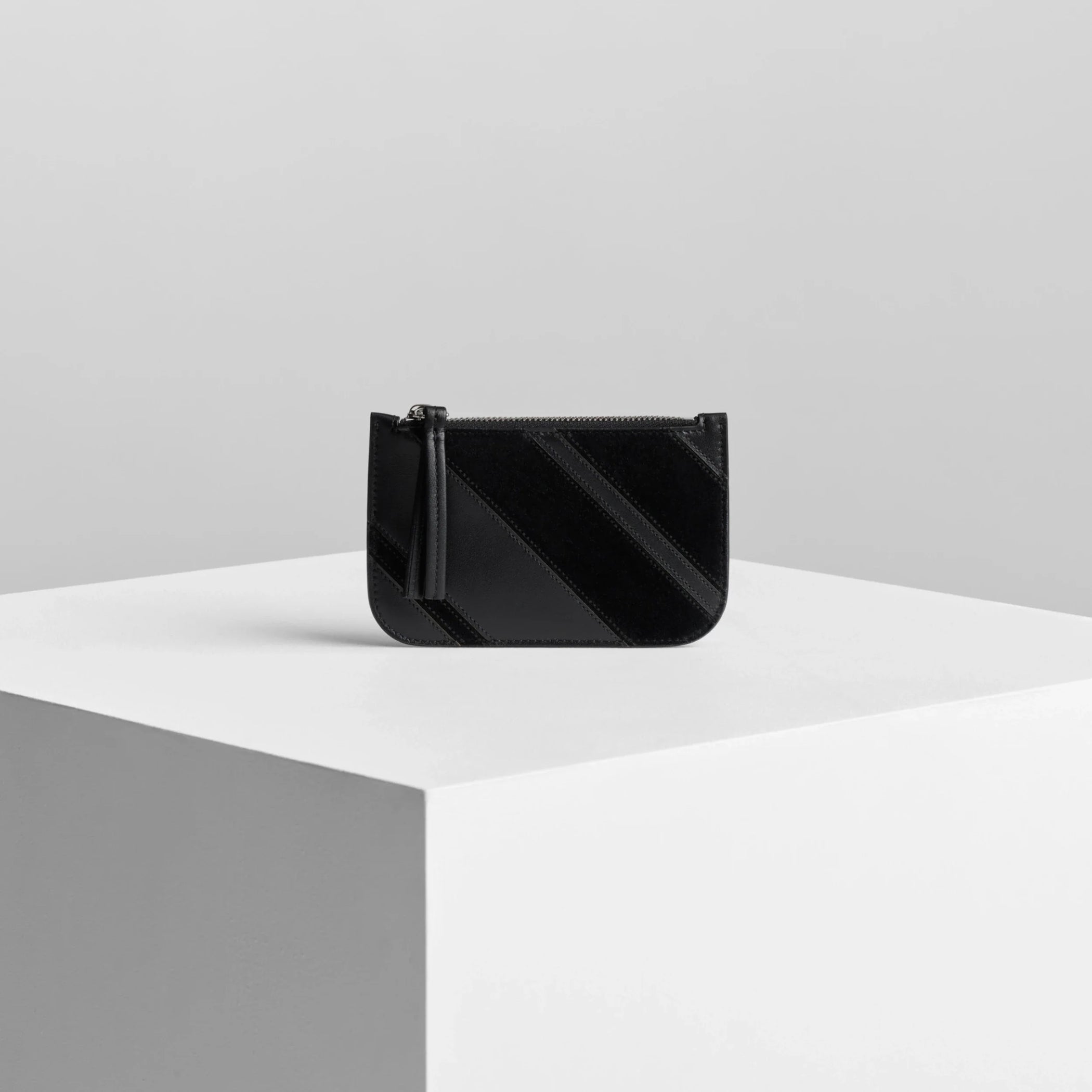 Front view of pocket card holder in black leather.