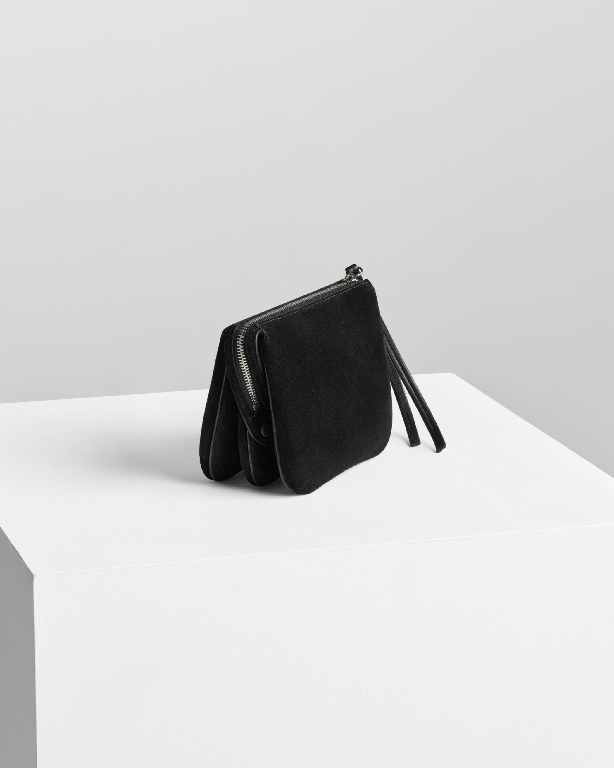 Side view of POCKET GIG in black suede leather