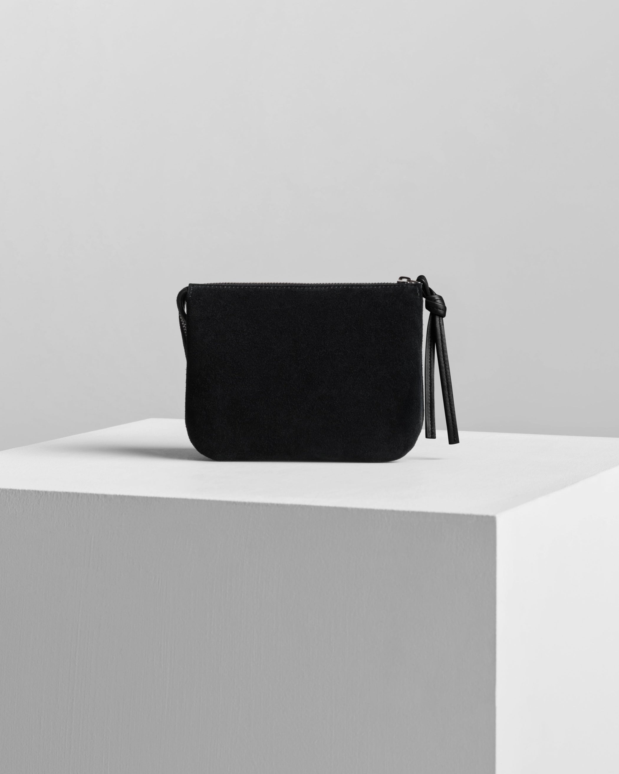 Back view of POCKET GIG in black suede leather