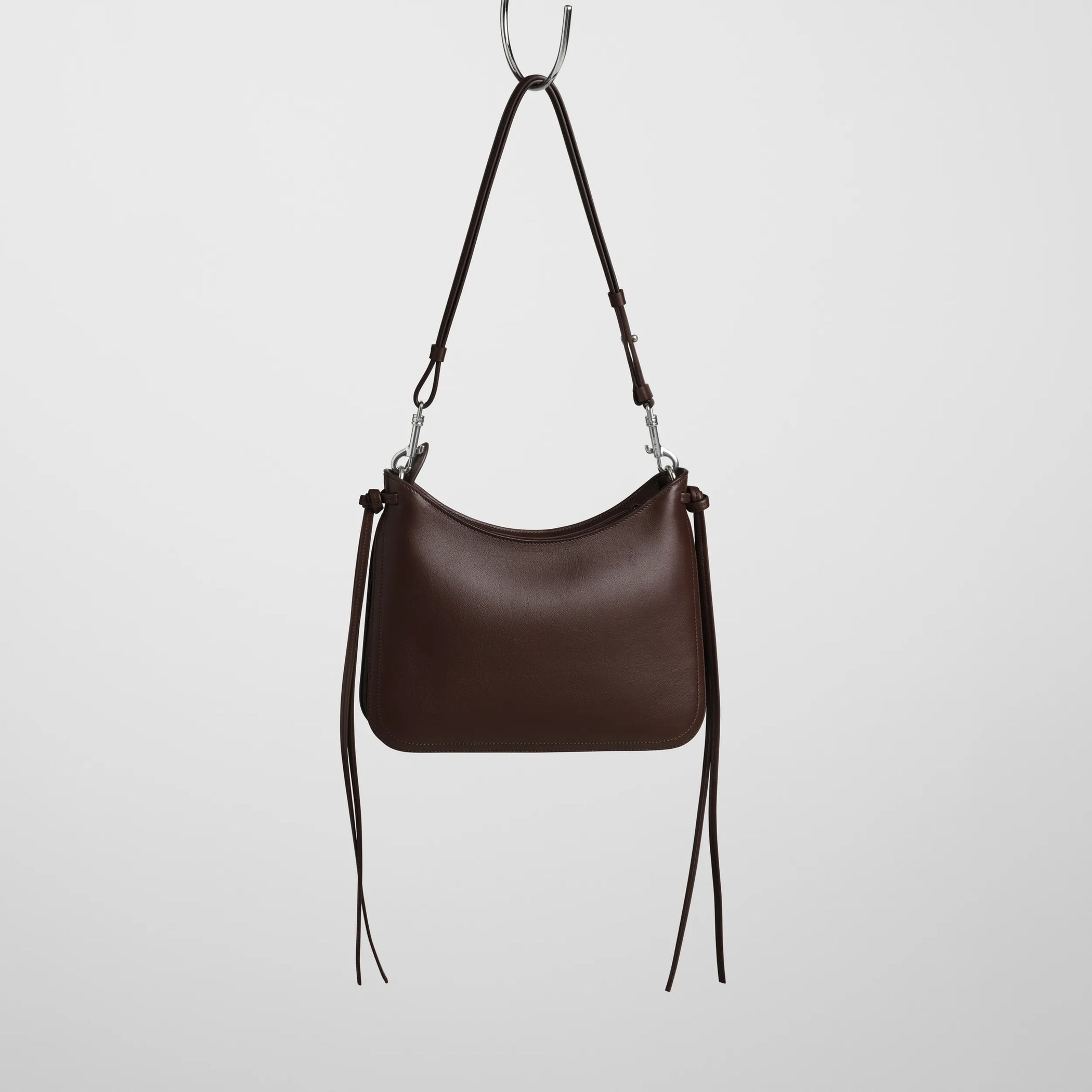 Back view of small gig in cognac leather.