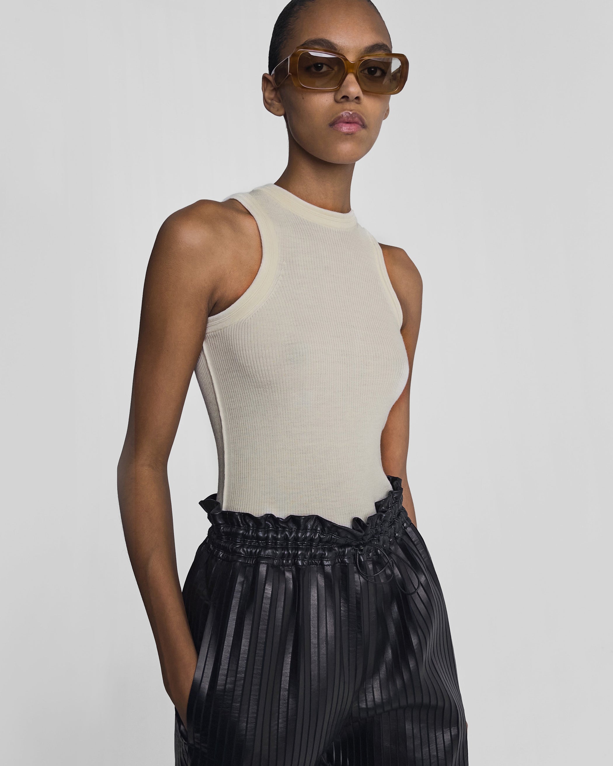 Front view of model wearing SCORE SUNGLASSES in tortoiseshell acetate