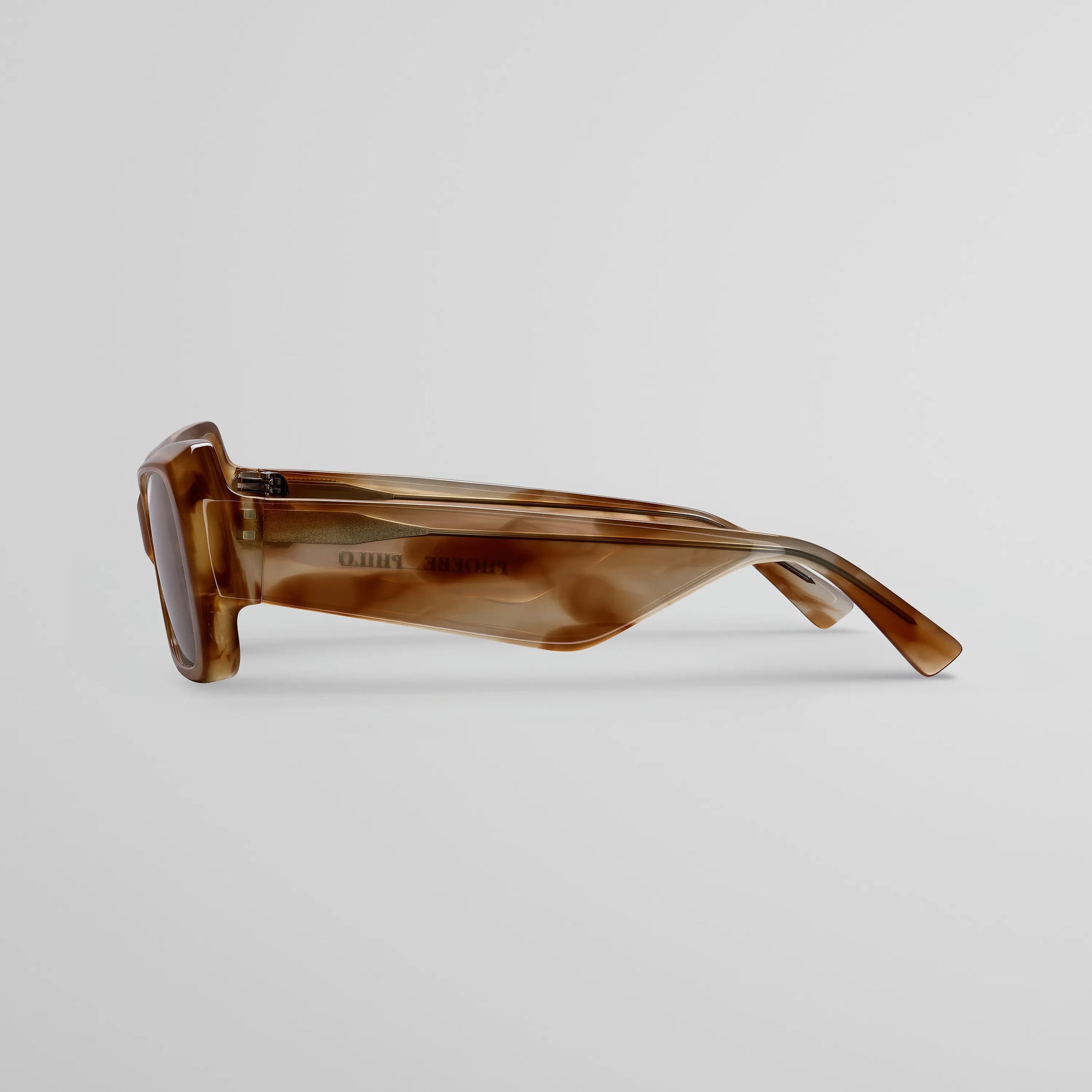 Side view of score sunglasses in tortoiseshell.