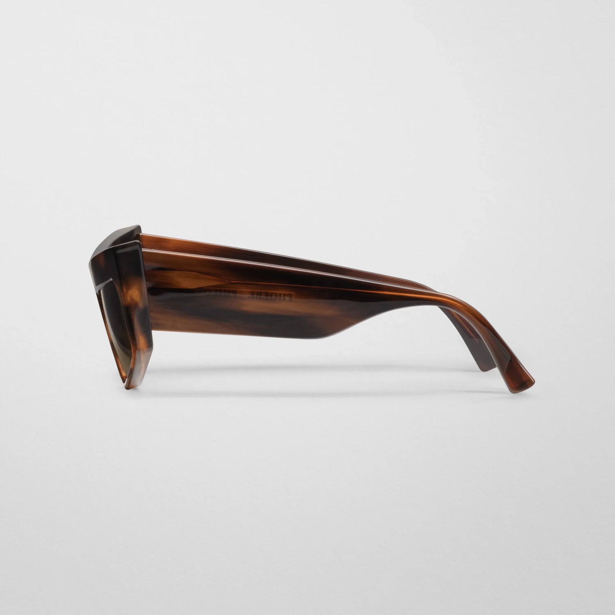 Side view of cruise sunglasses in tawny tortoiseshell acetate.