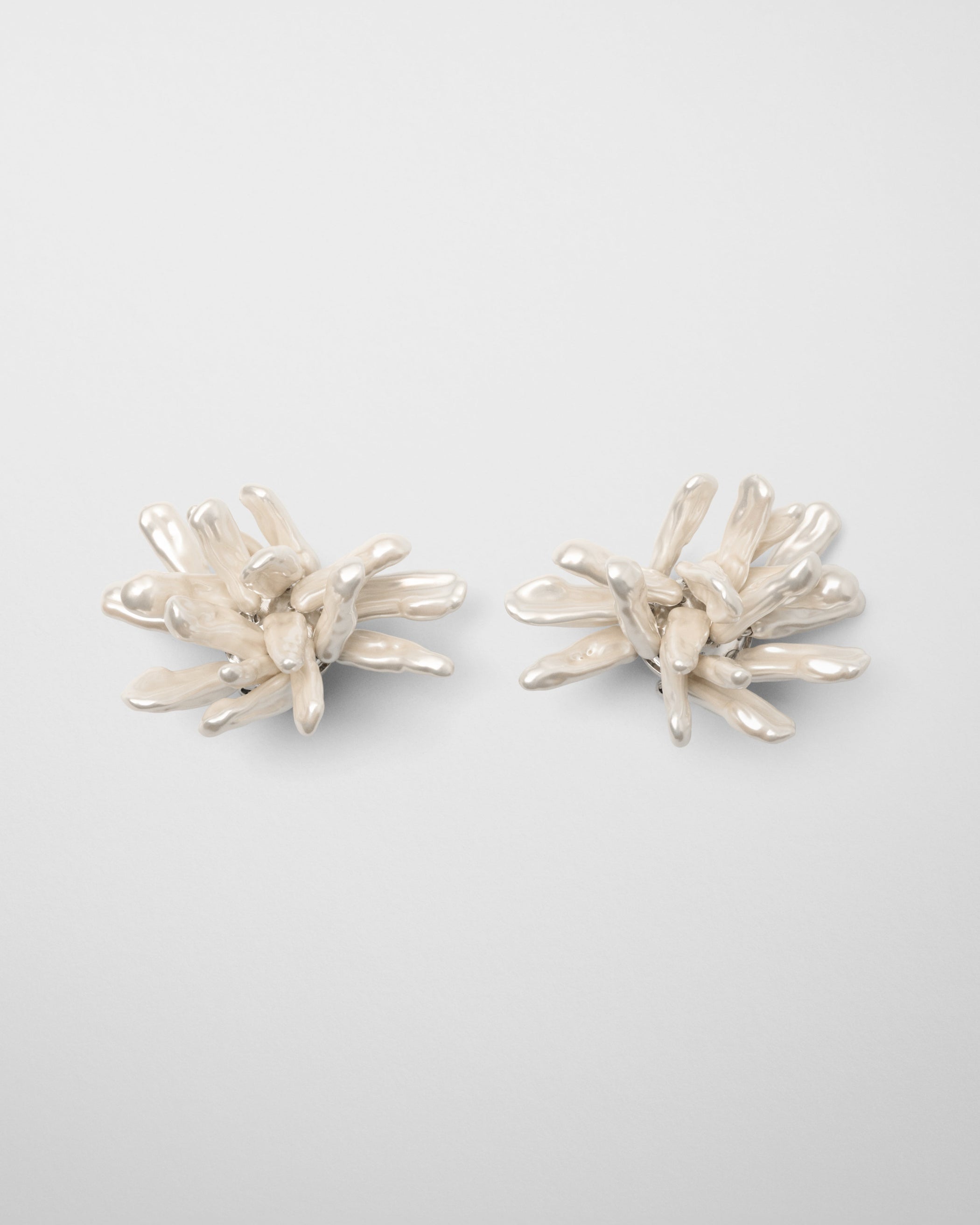 Front view of CLUSTER EARRINGS in silver cream resin