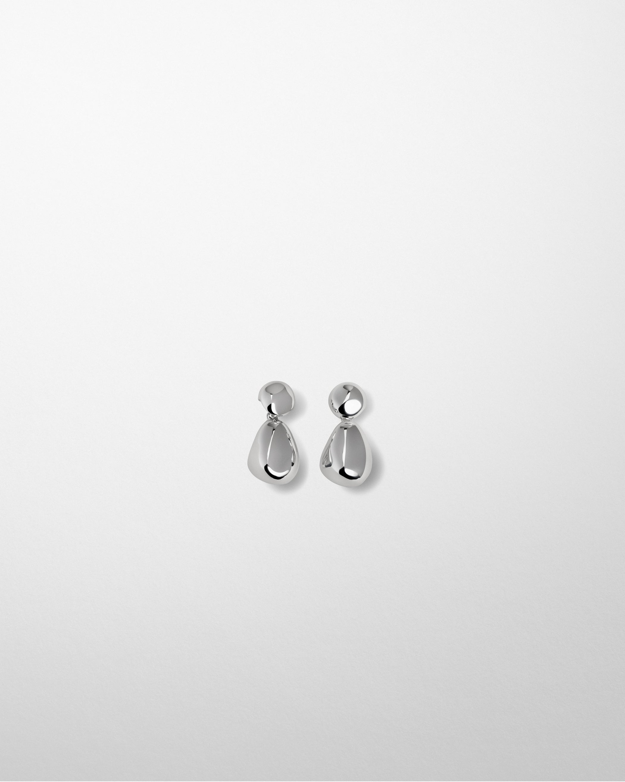 Flat front view of DOUBLE BALL EARRINGS in sterling silver