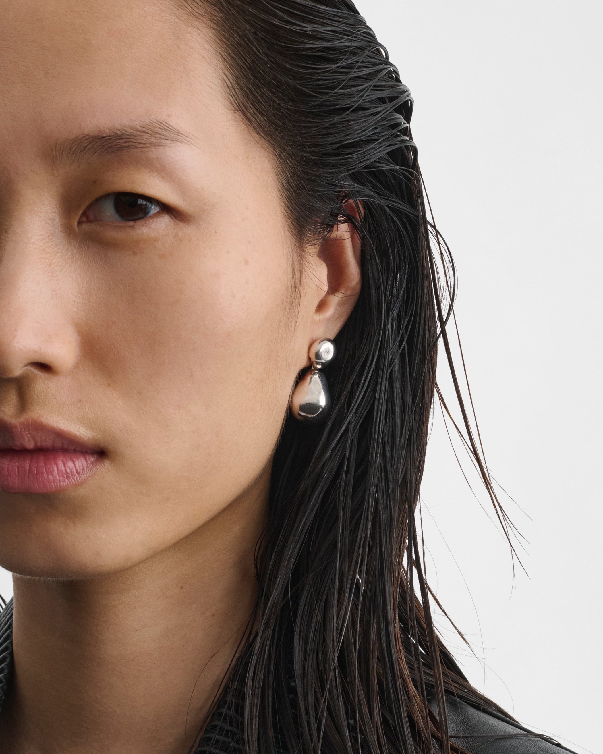 Model wearing DOUBLE BALL EARRINGS in sterling silver