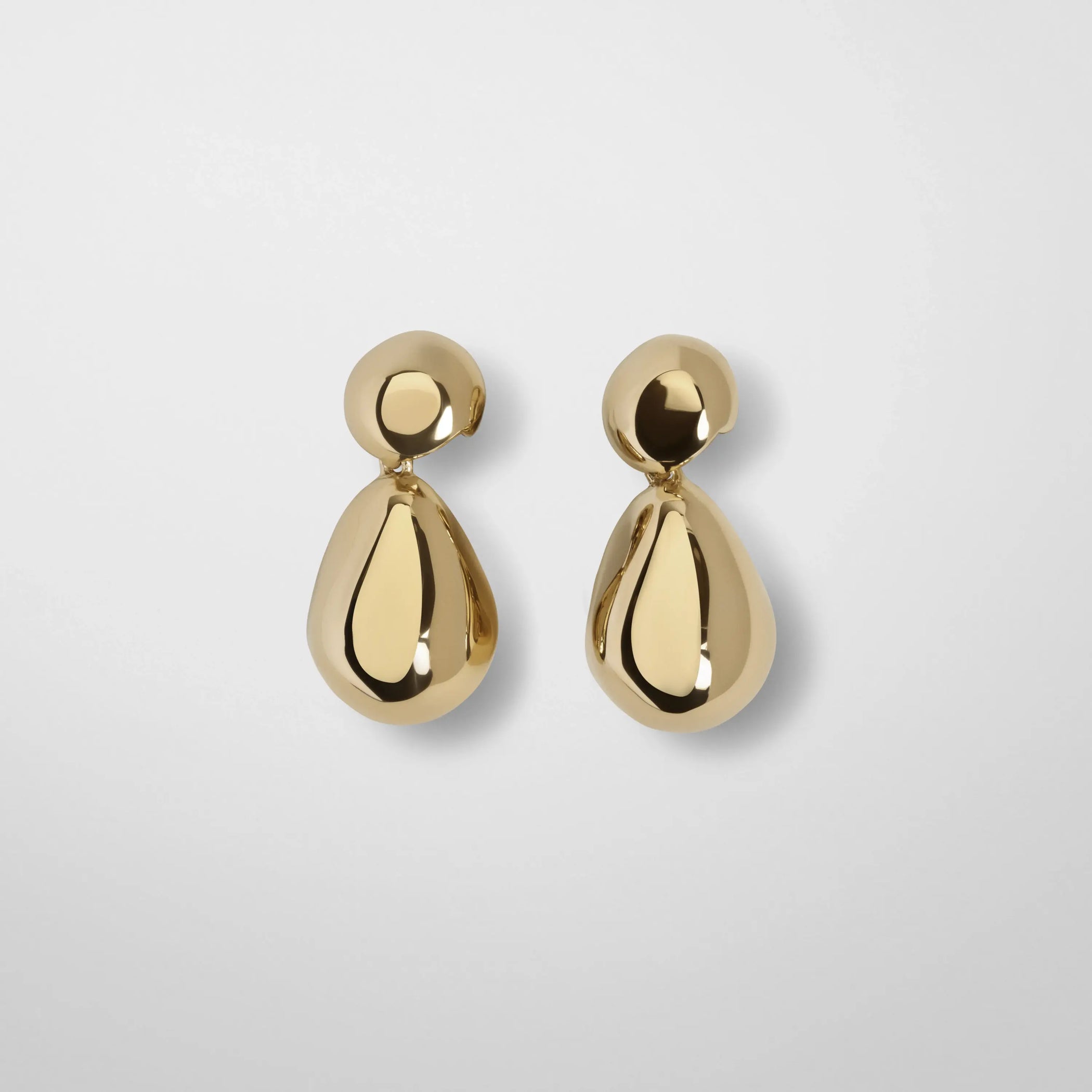 Flat front view of double ball earrings in gold plated sterling silver.