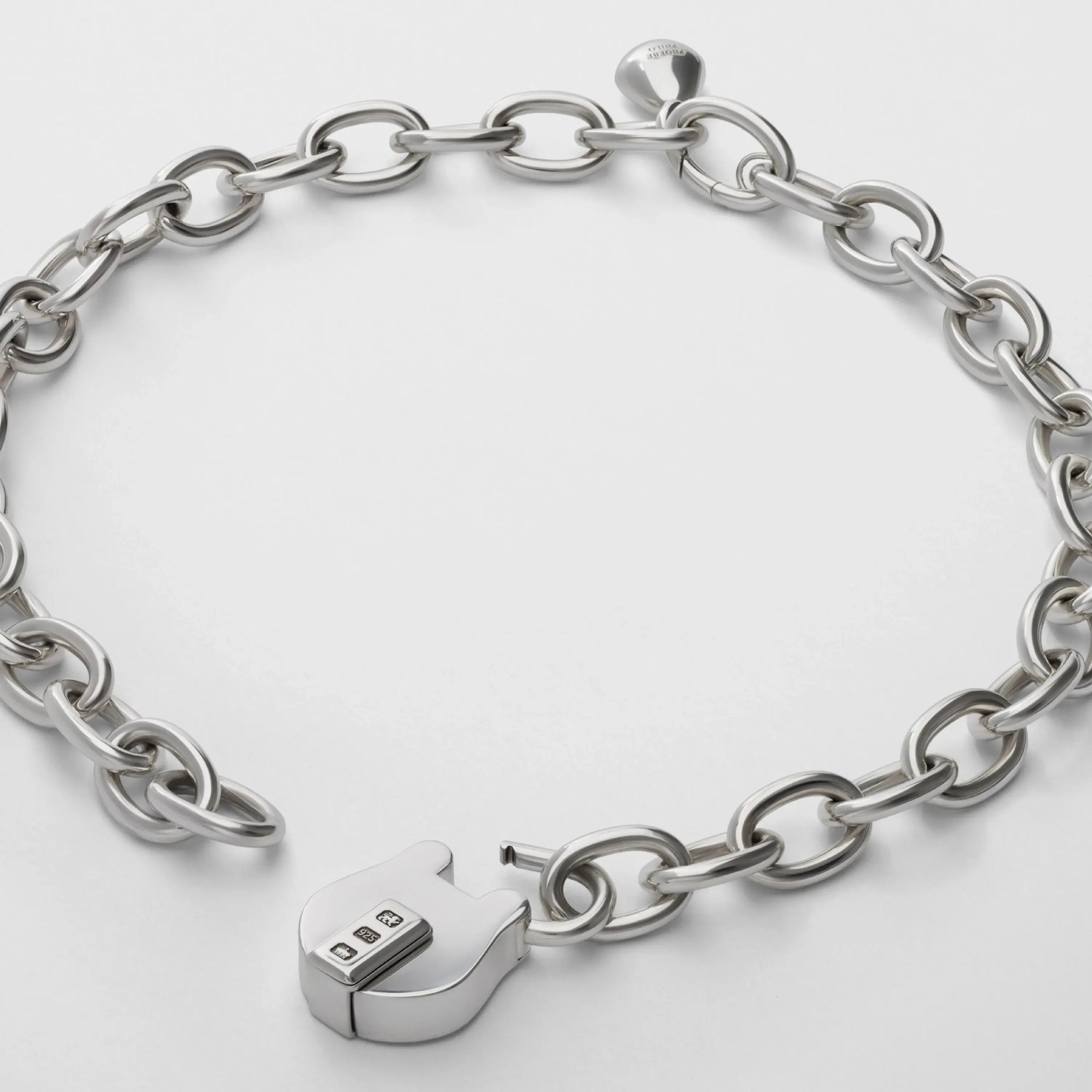 Close up detail view of padlock choker in sterling silver