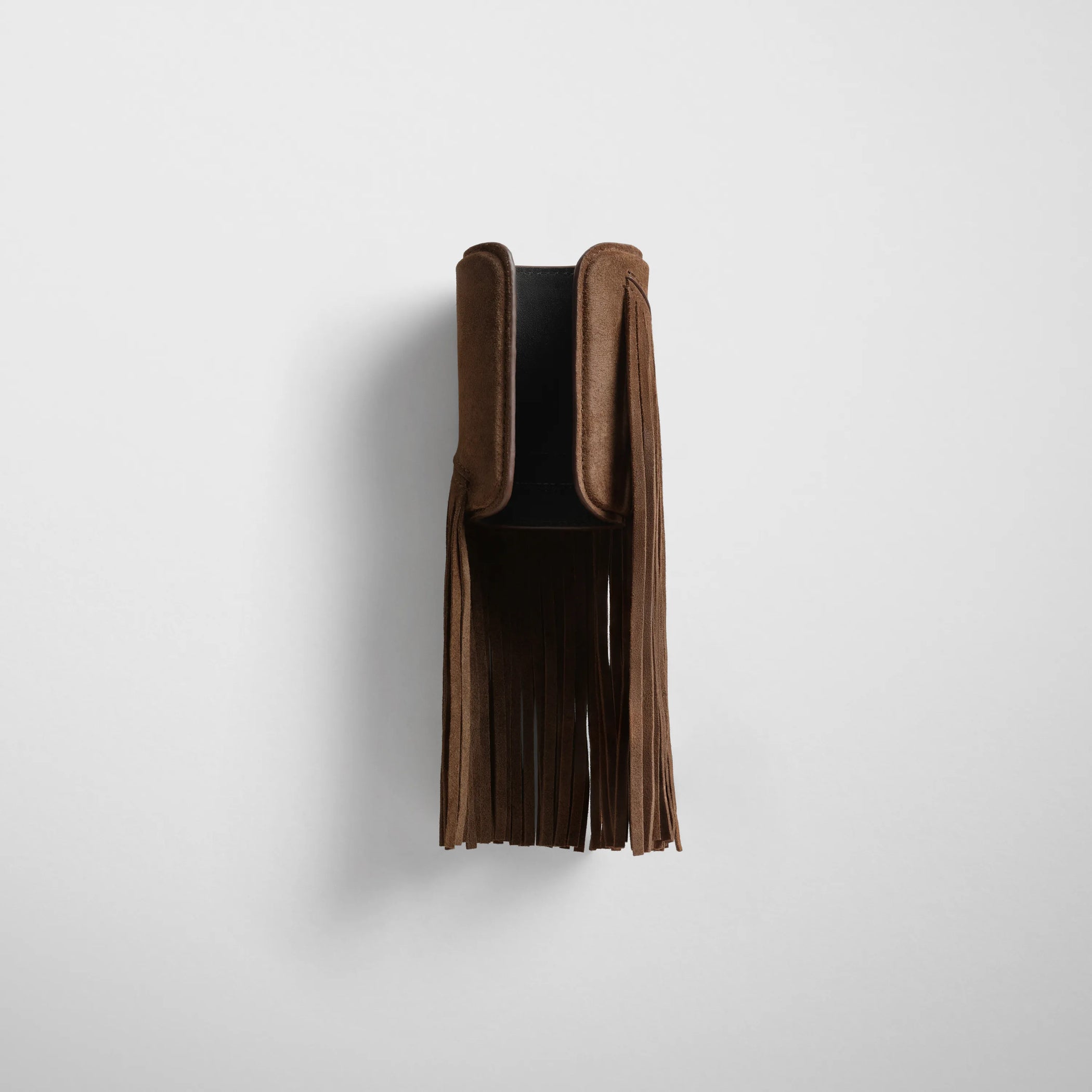 Back view of fringe cuff in khaki