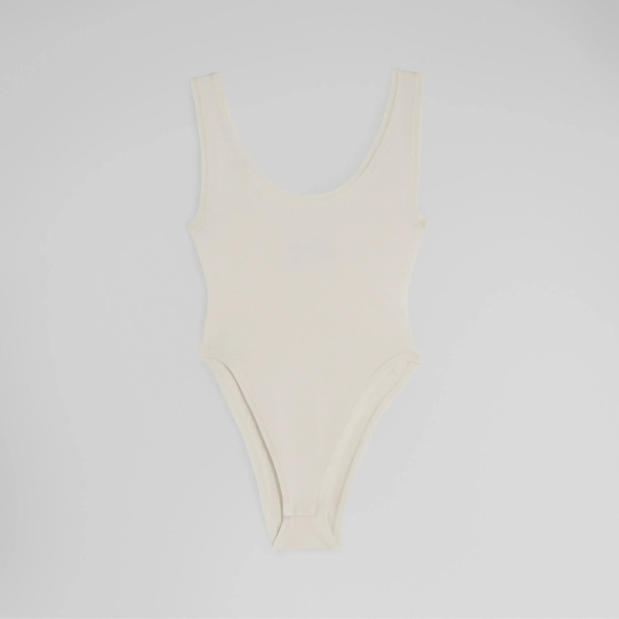 Flat front shot of BODY in off white silk