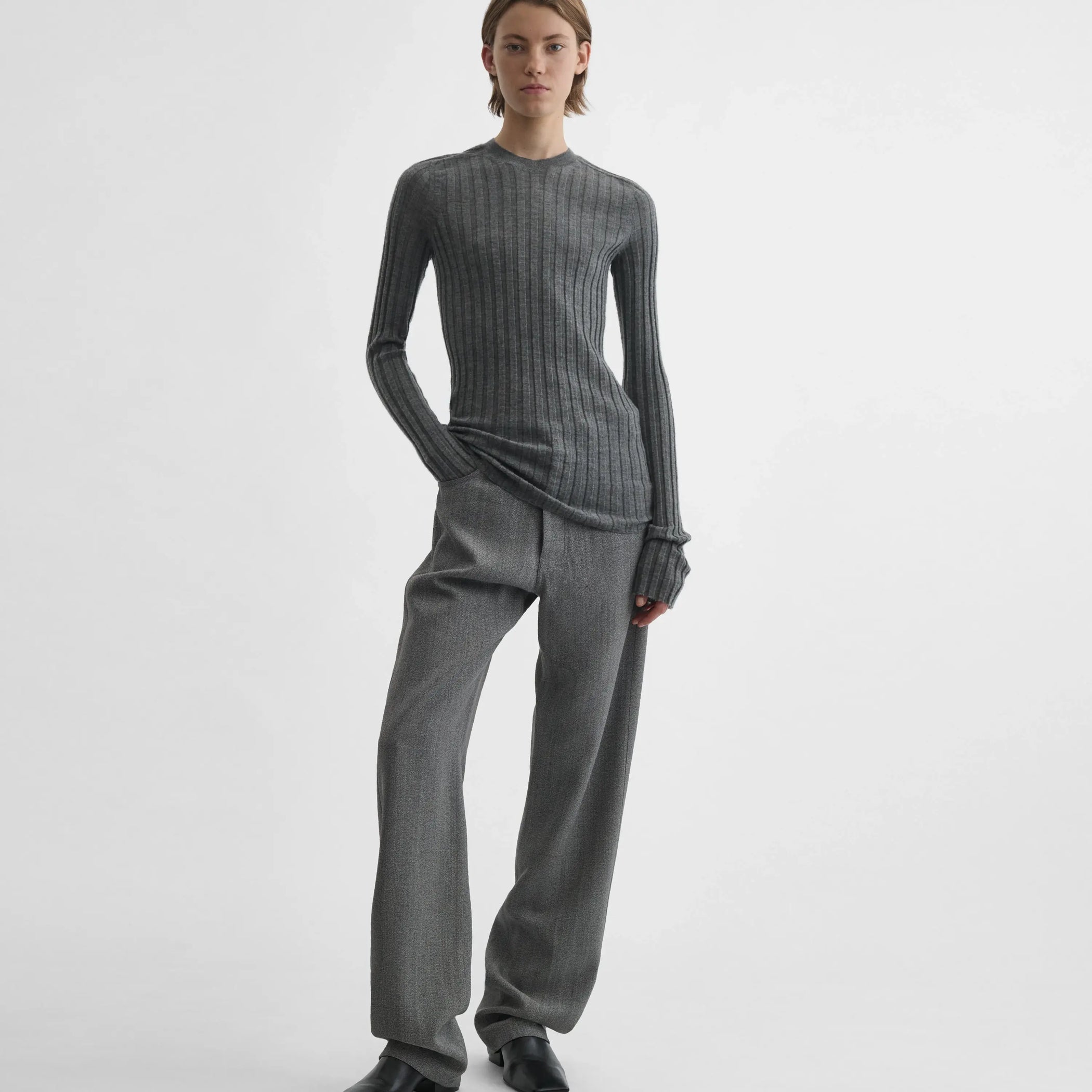 Full body front view of model wearing Wide Rib Crewneck in grey.