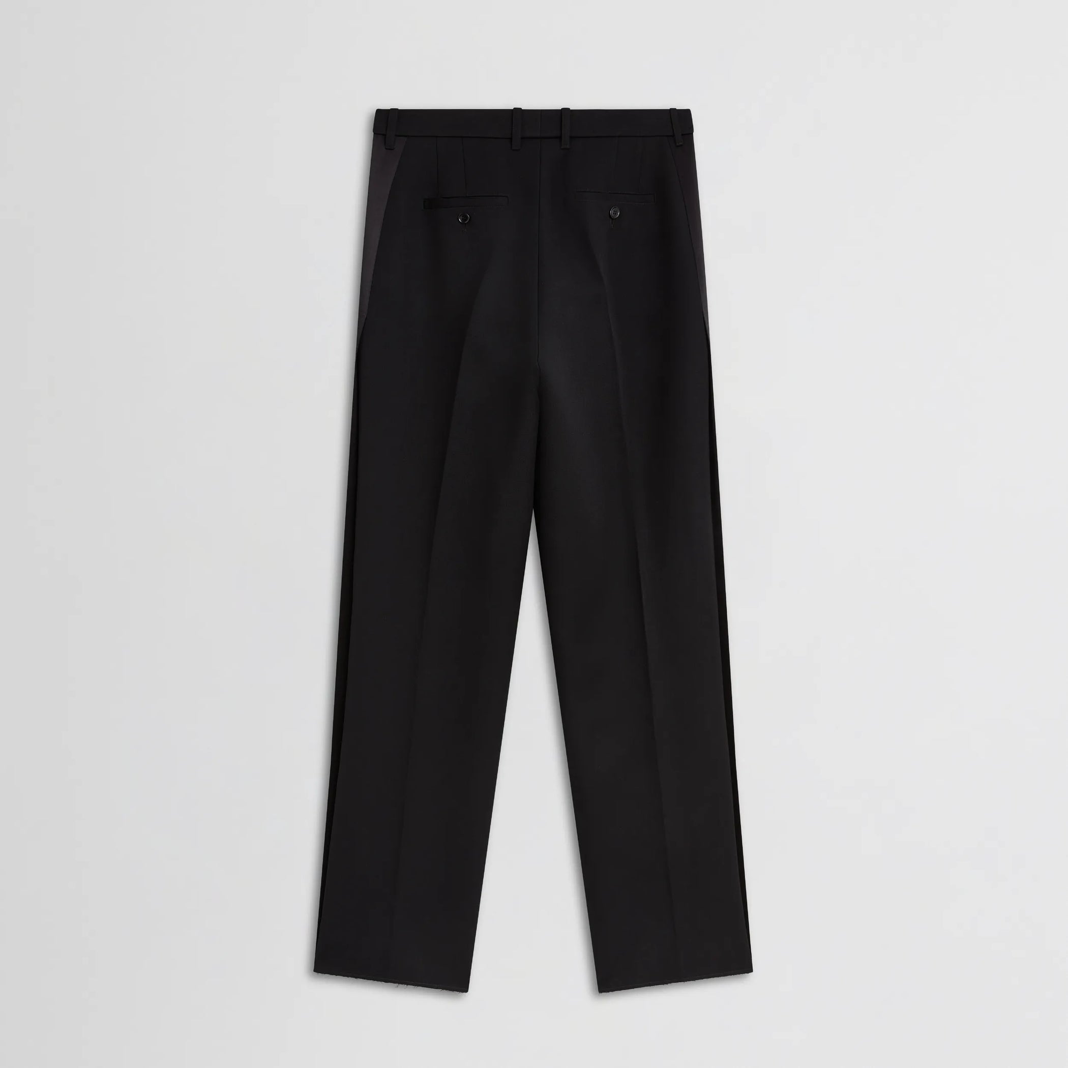 Flat back view of tux trousers in black viscose