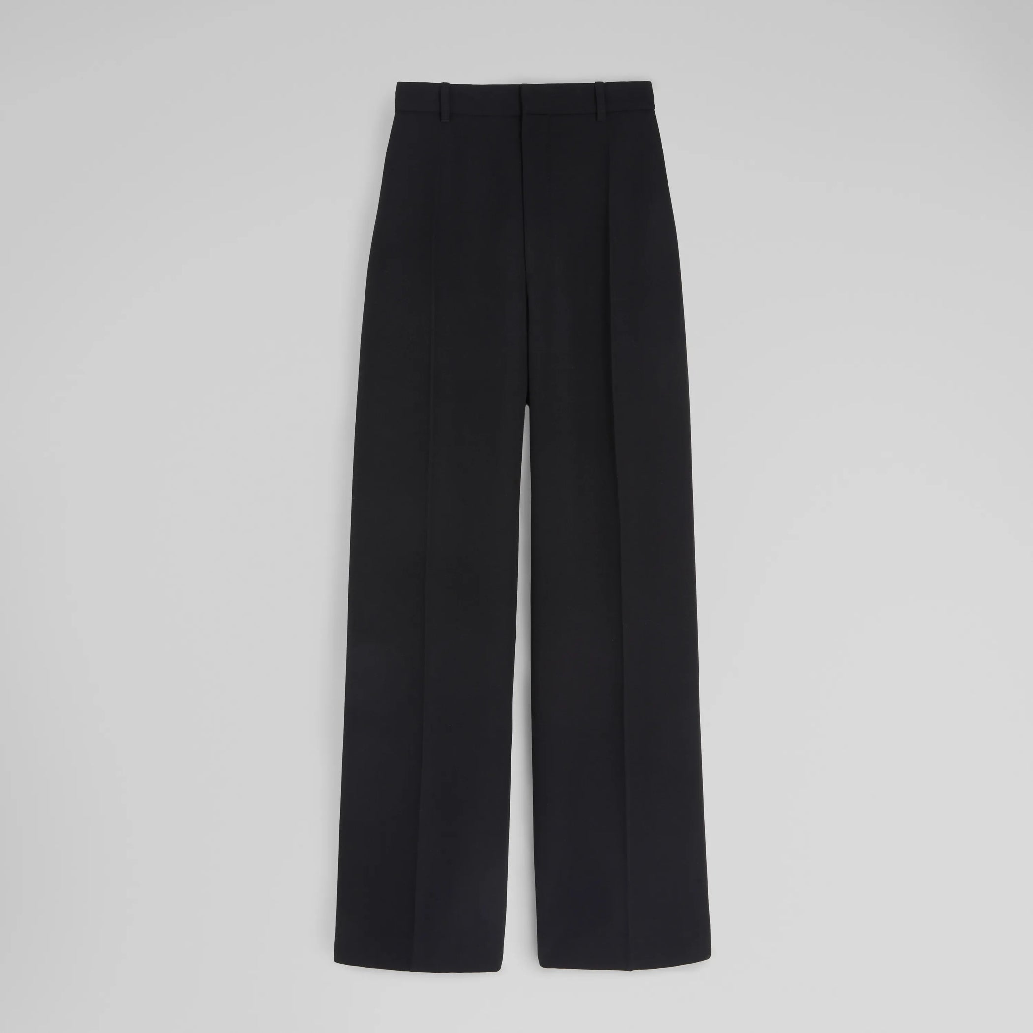 Front view of zip trousers in black wool