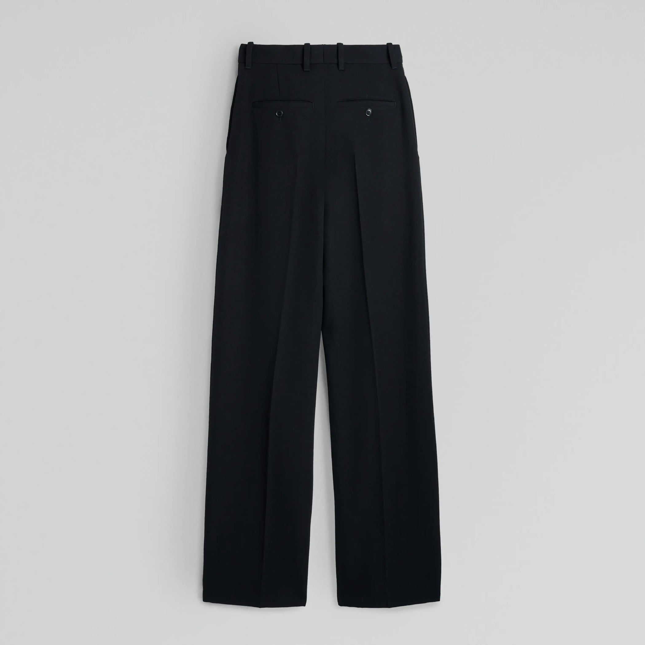 Back flat lay of Milanese Trousers in black.