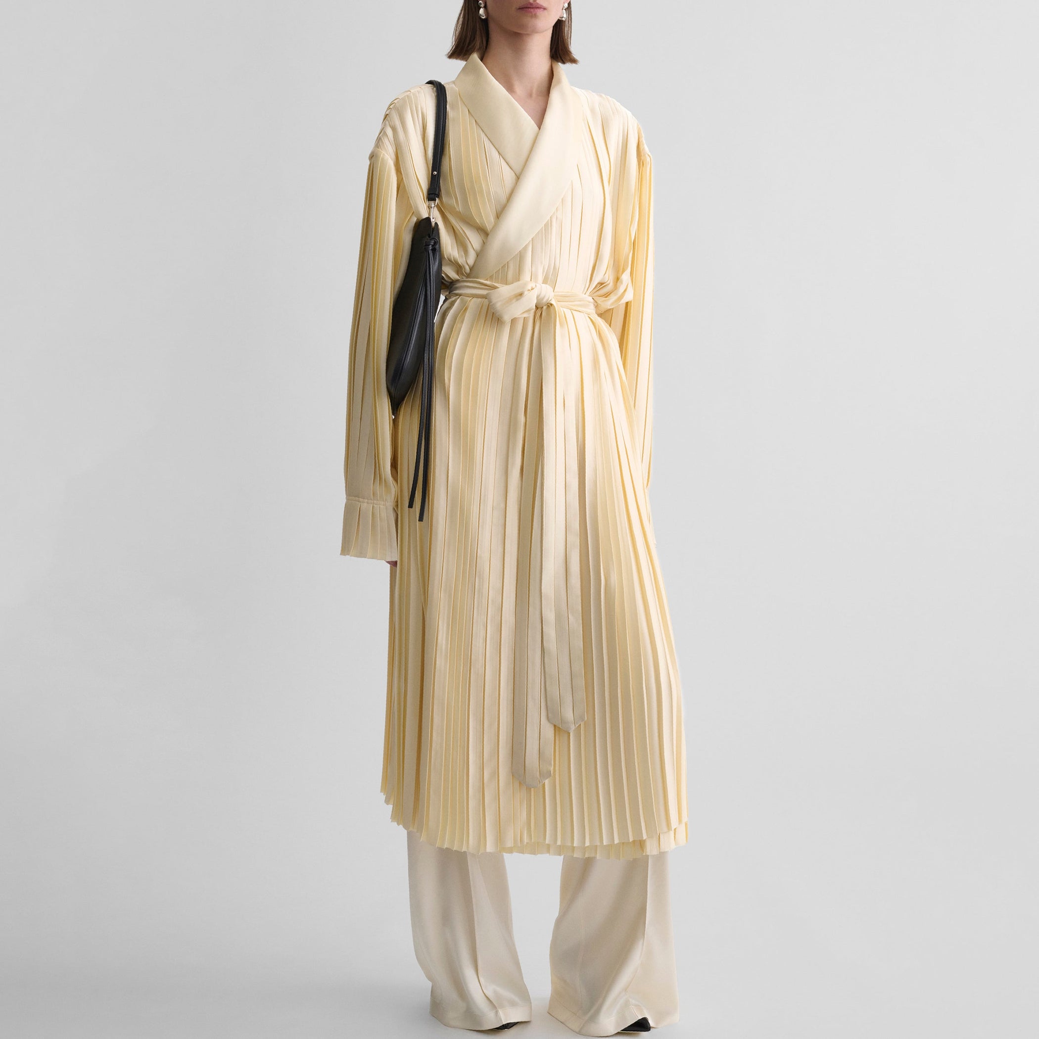 Front view of model wearing PLEATED ROBE in vanilla satin