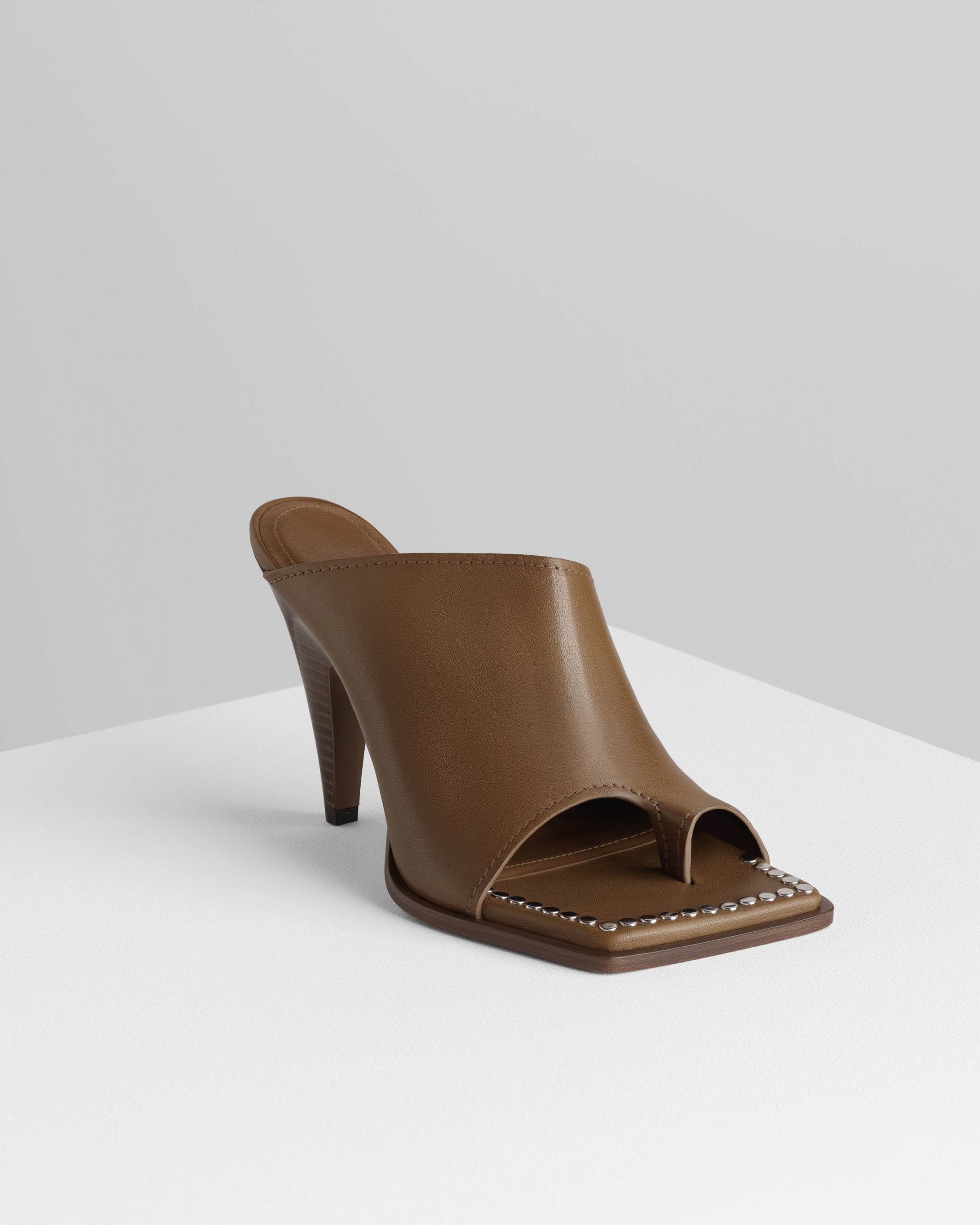 Side view of BOLO MULE 105 in caramel leather