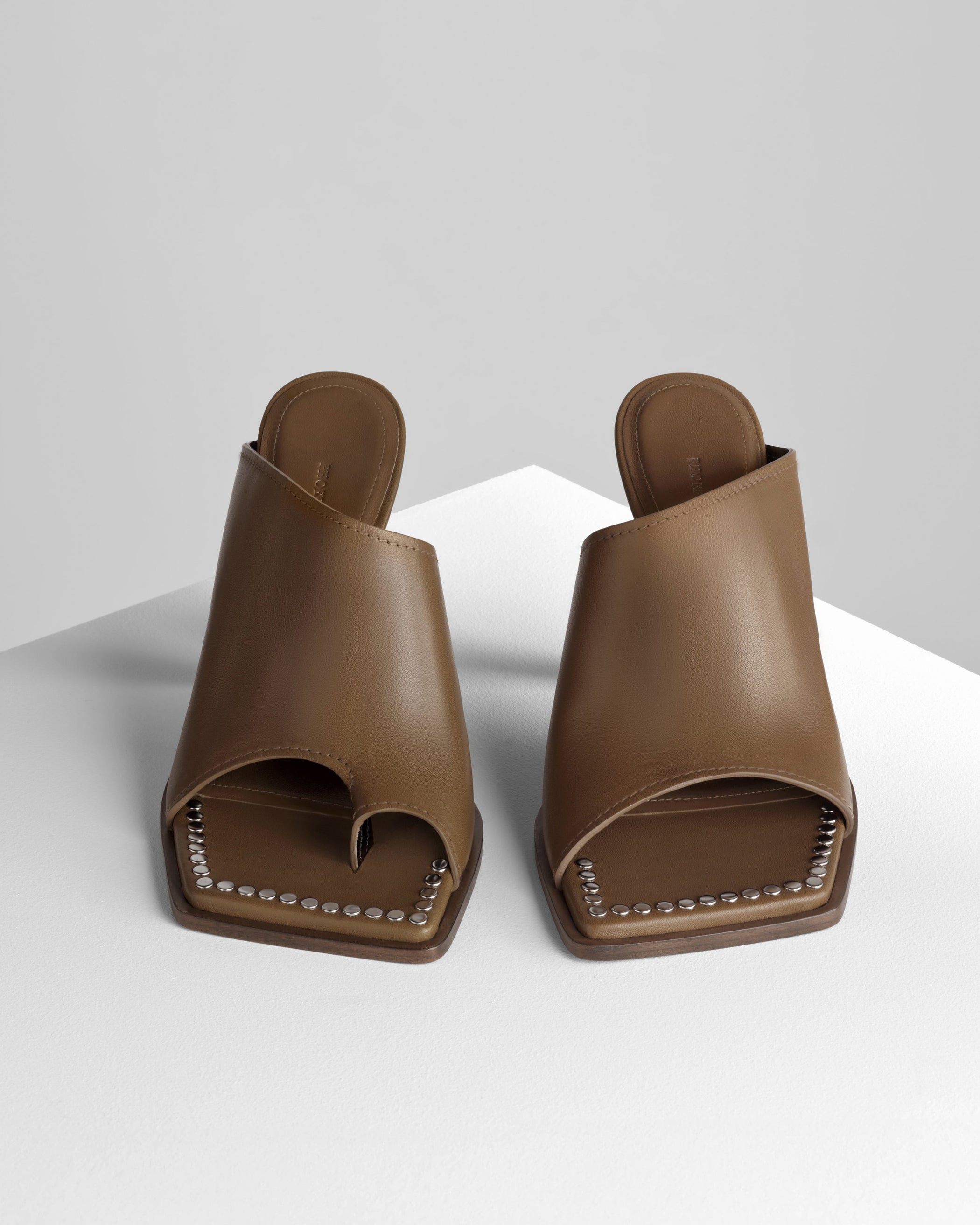 Front view of BOLO MULE 105 in caramel leather