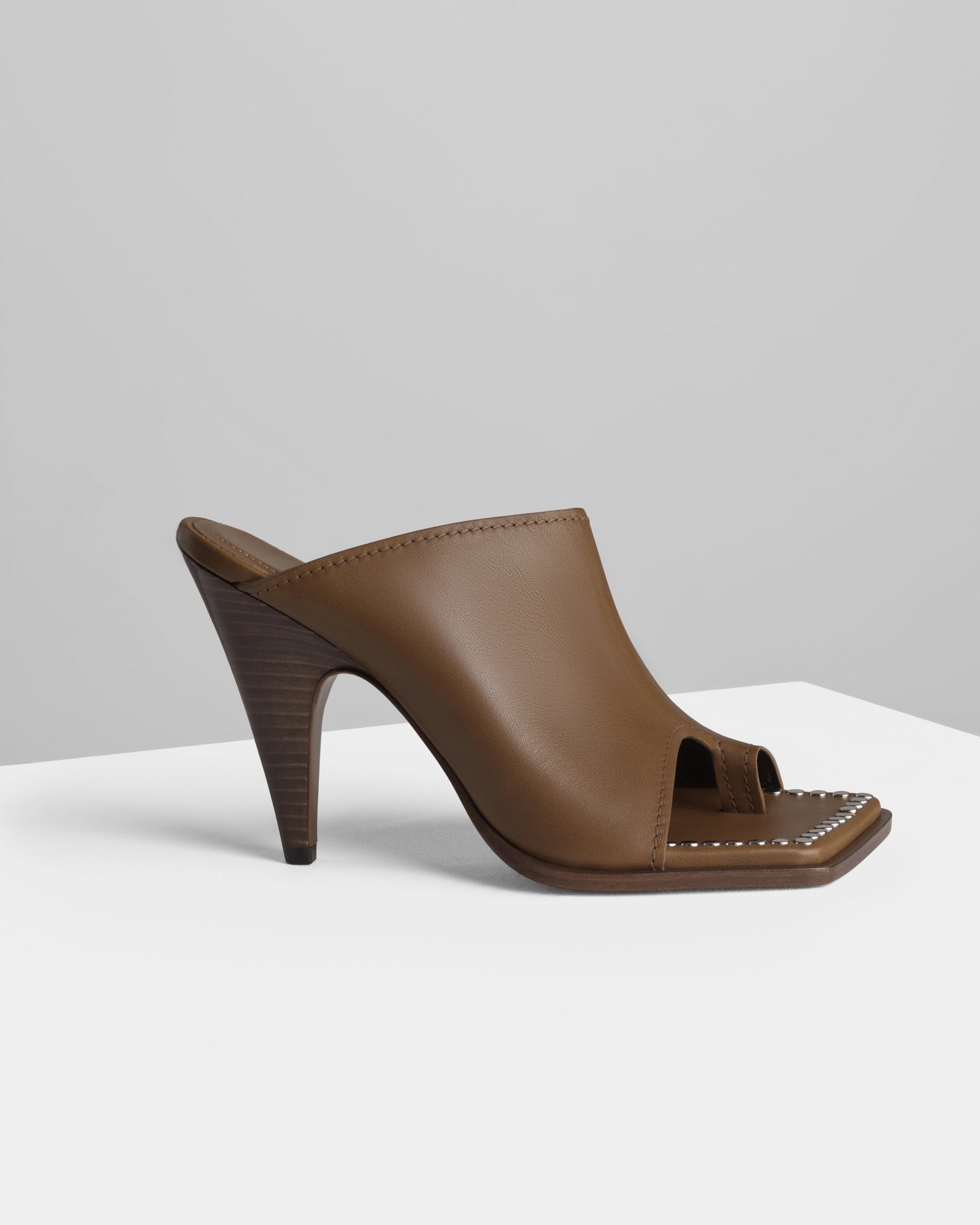 Side view of BOLO MULE 105 in caramel leather