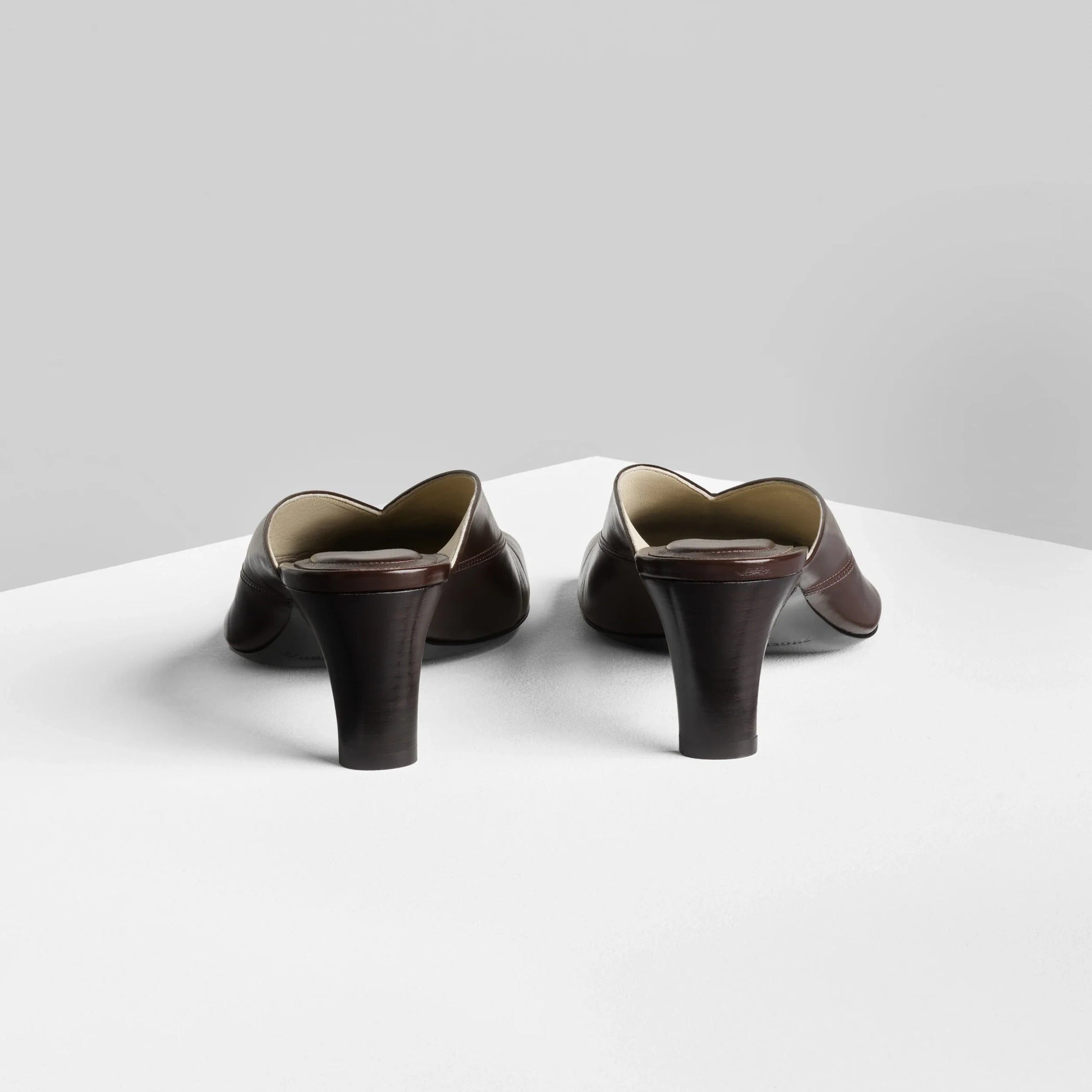 Back view of tilt mule in oxblood leather.