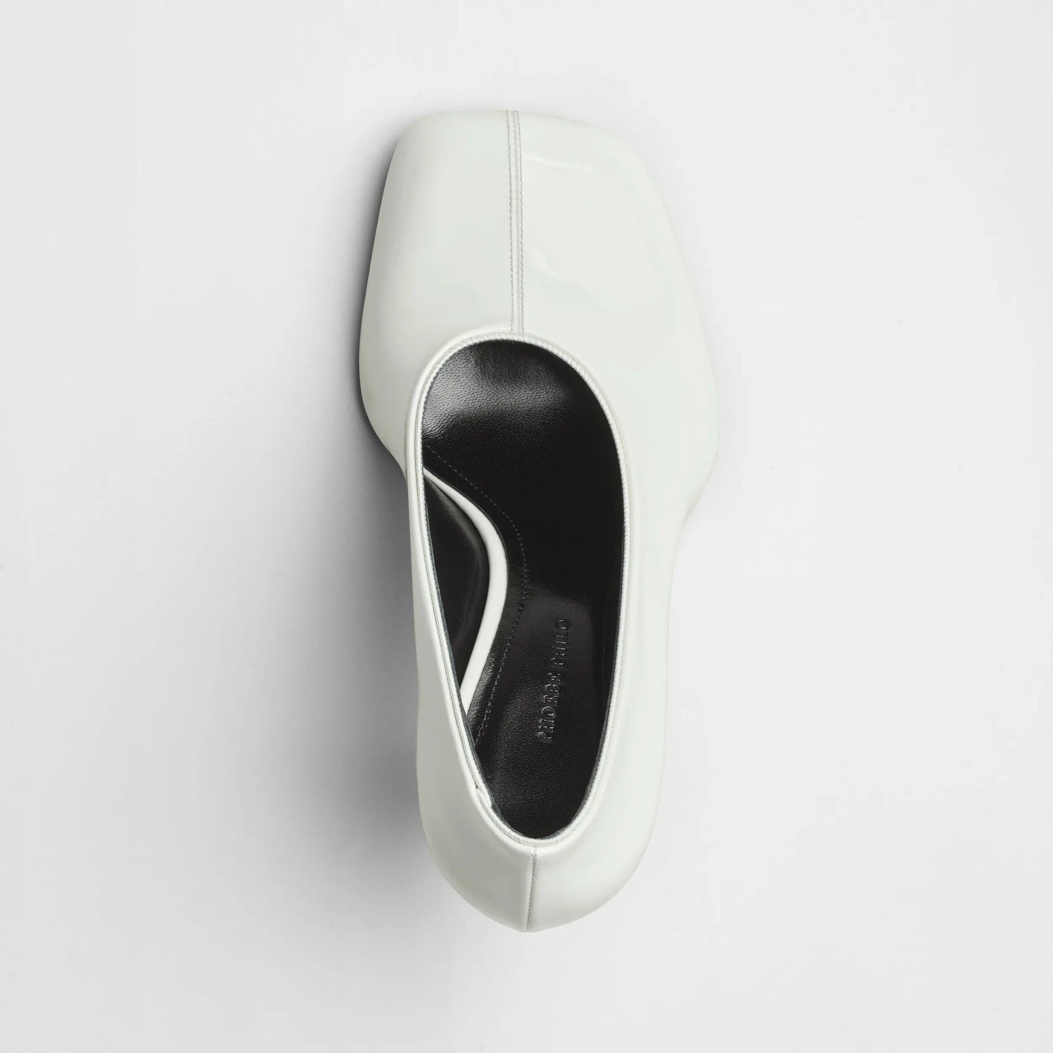 Top view of soft pump 90 in white patent leather