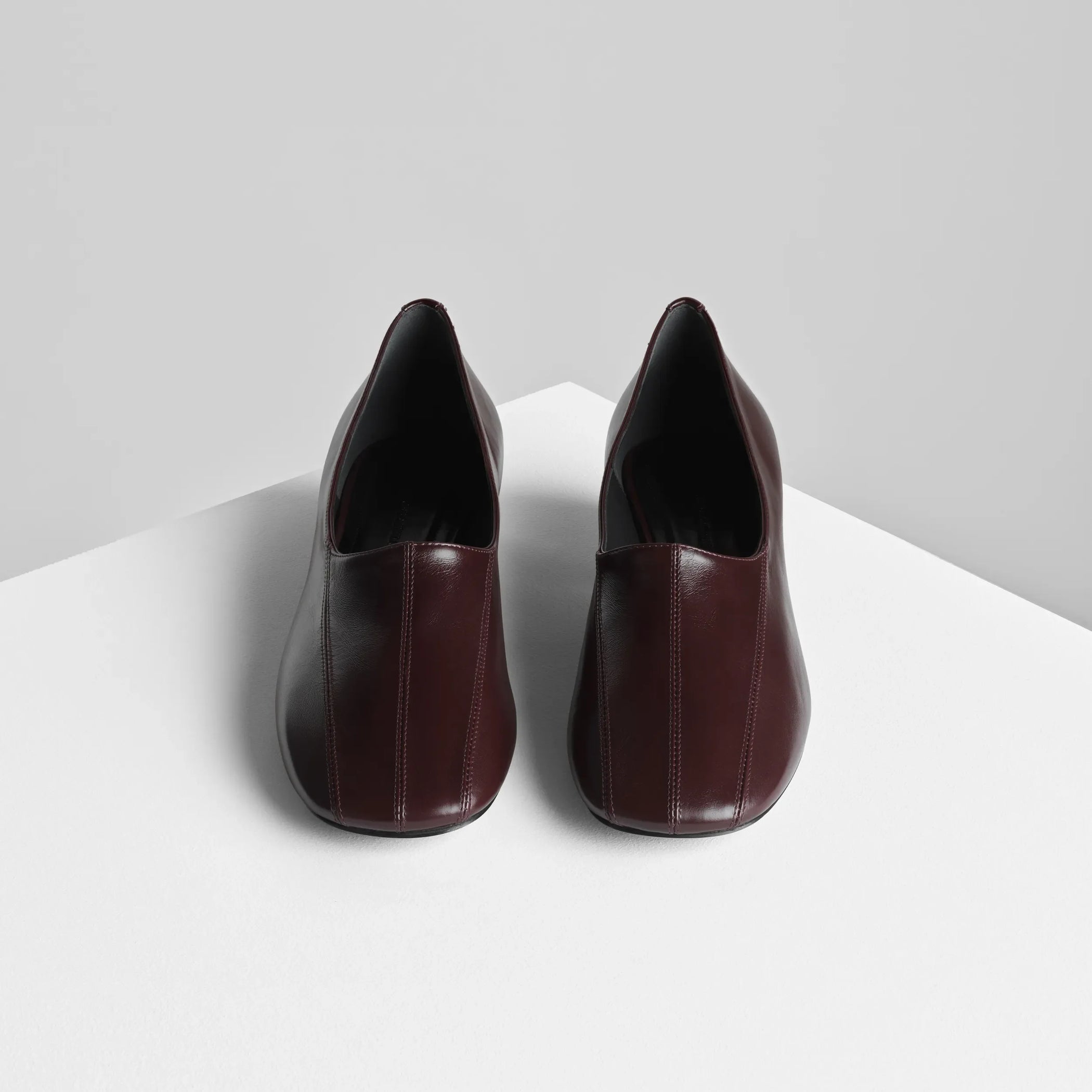 Top view of club slipper in oxblood shiny leather