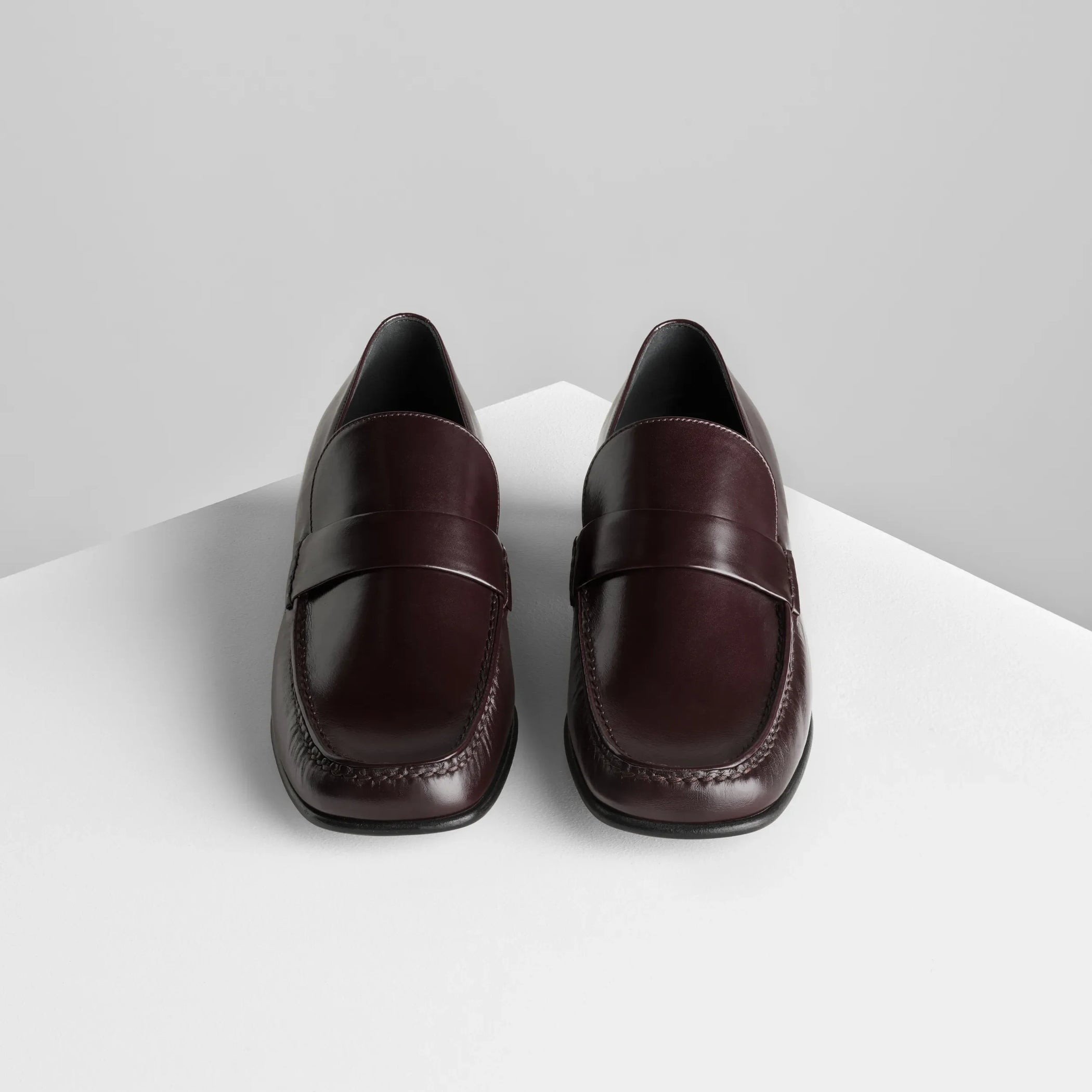 Top front view of man&#39;s loafer in oxblood leather