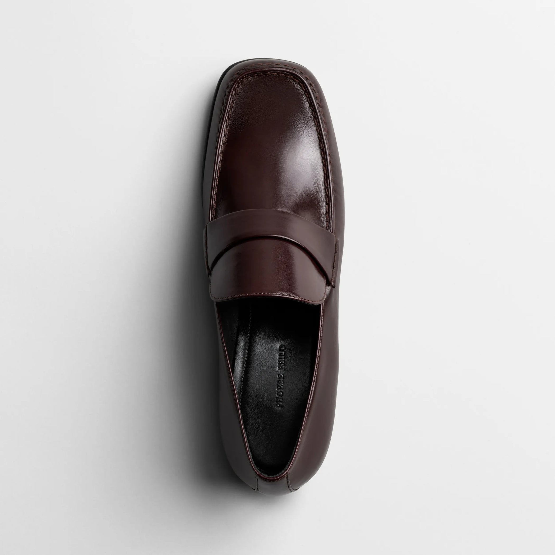 Top view of man&#39;s loafer in oxblood leather