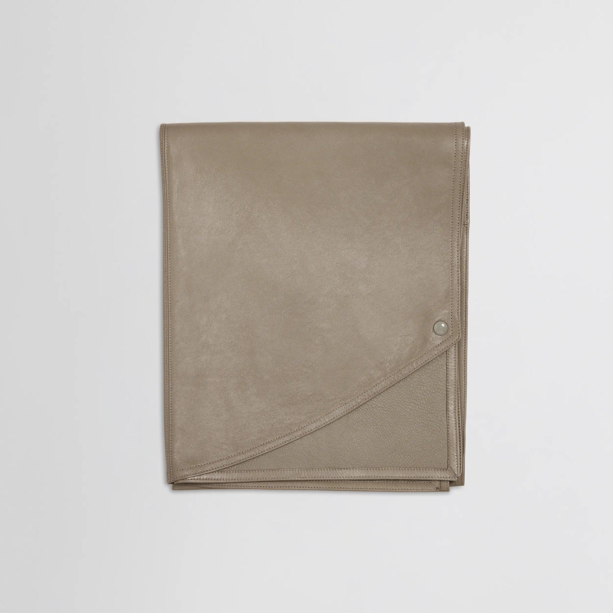 Flat view of attachable scarf in mastic leather