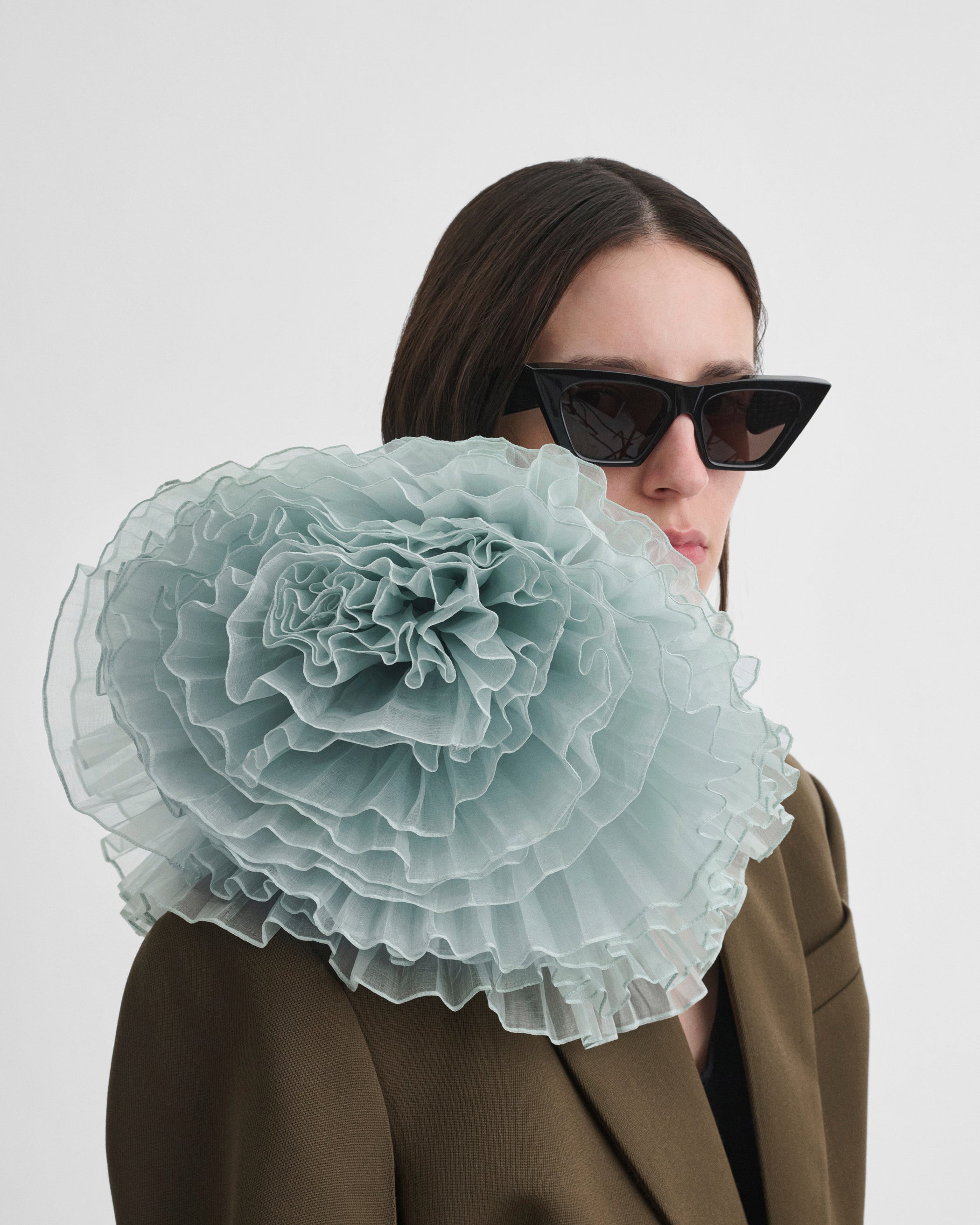 Model wearing FULL BLOOM BROOCH in hazy blue silk