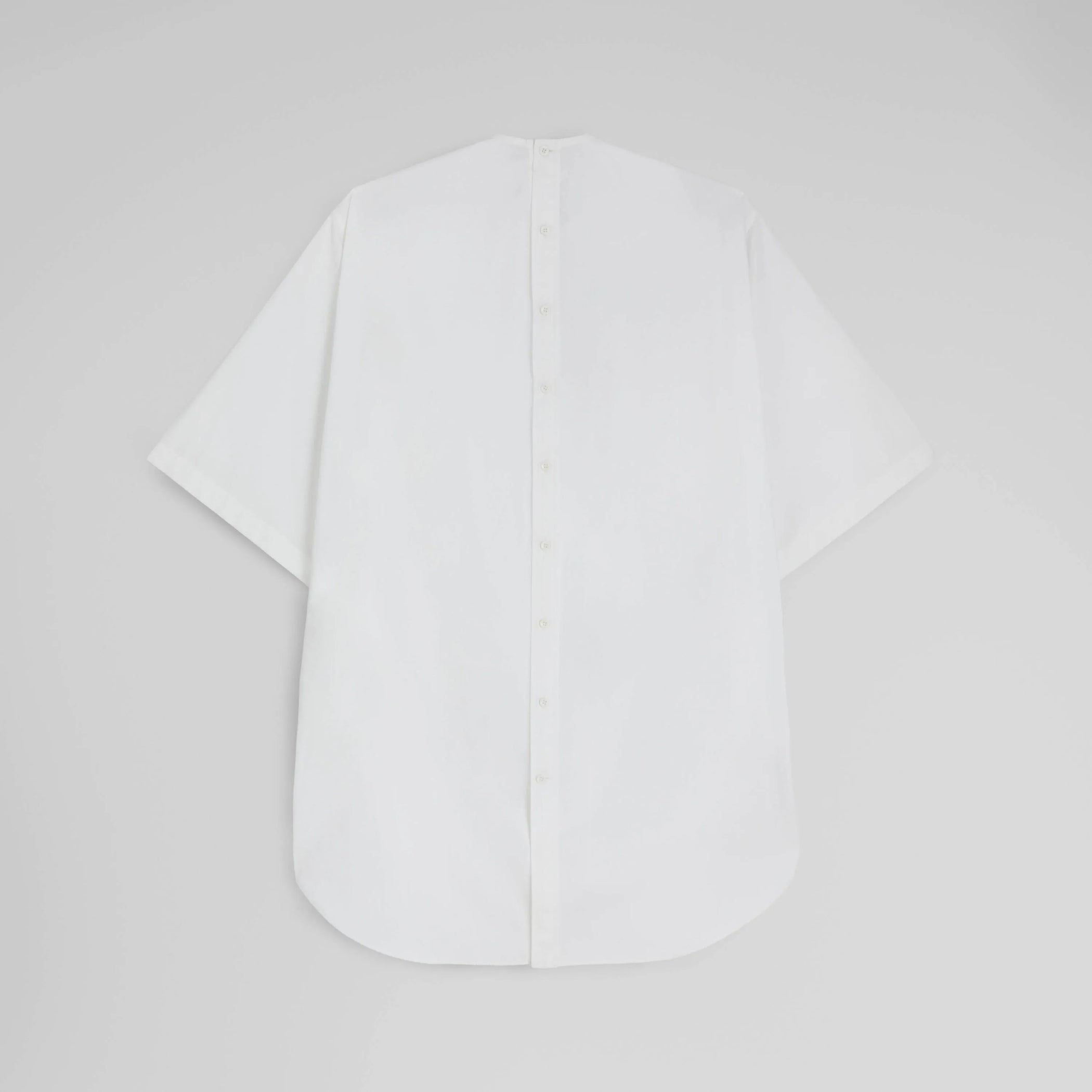 Flat back view of T-SHIRT in white cotton shirting