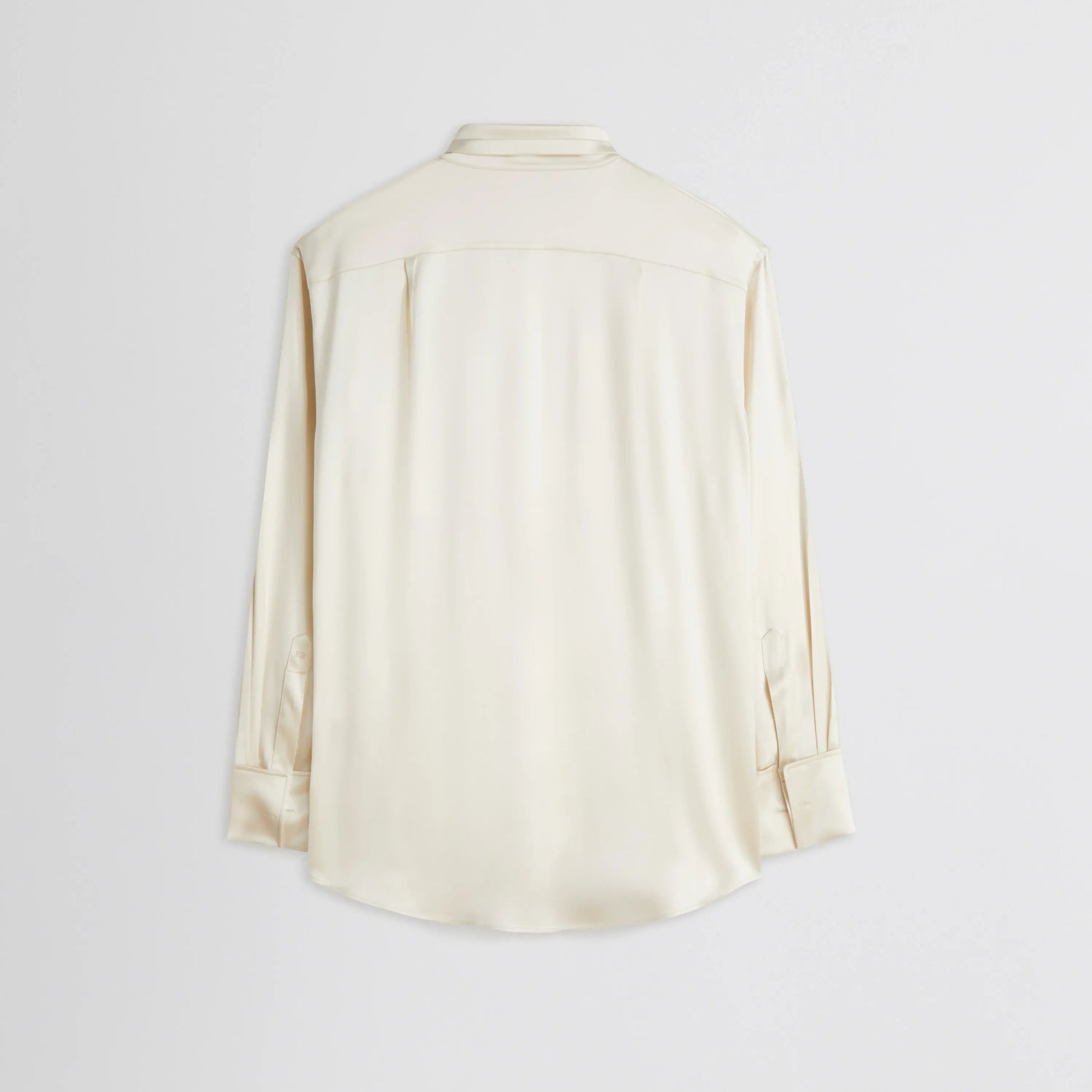 Back flat lay of Tie Neck Shirt in cream.