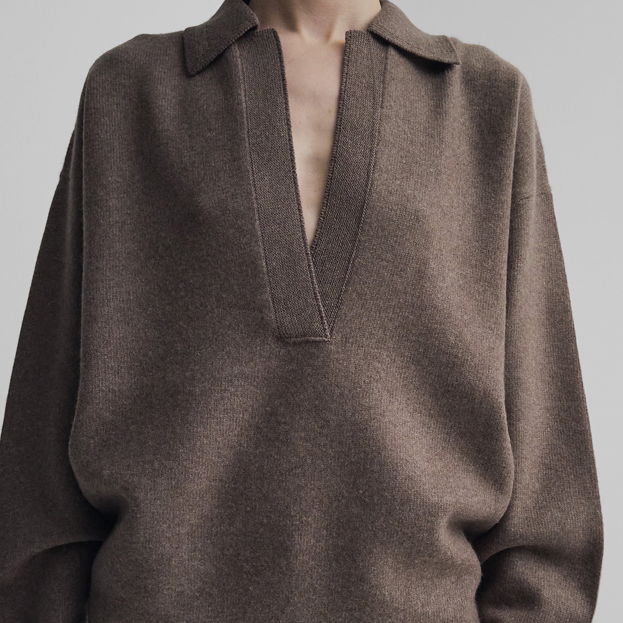 Front detail view of model wearing SOFT SHIRT COLLAR JUMPER in dun