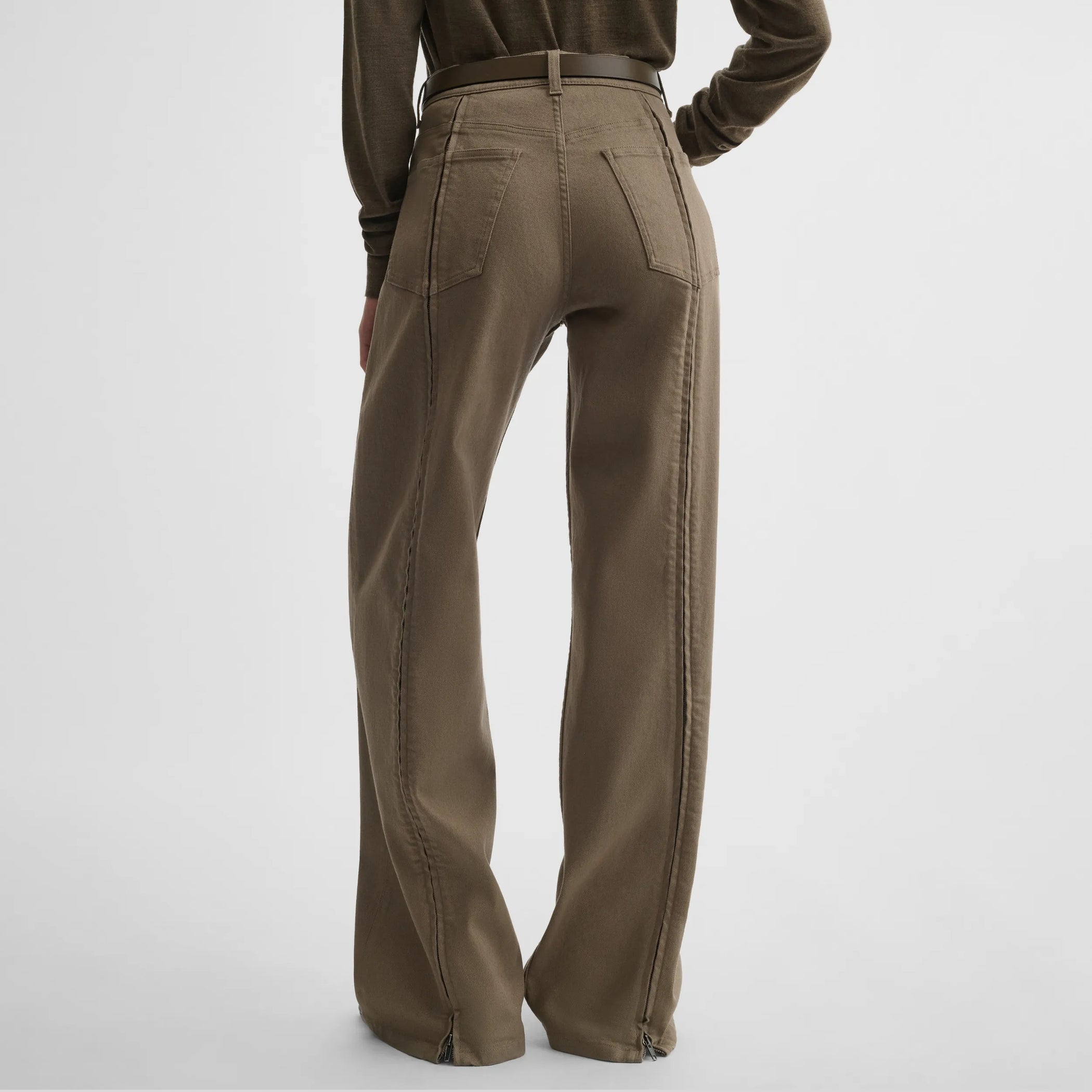 Back view of zip jeans in warm khaki cotton