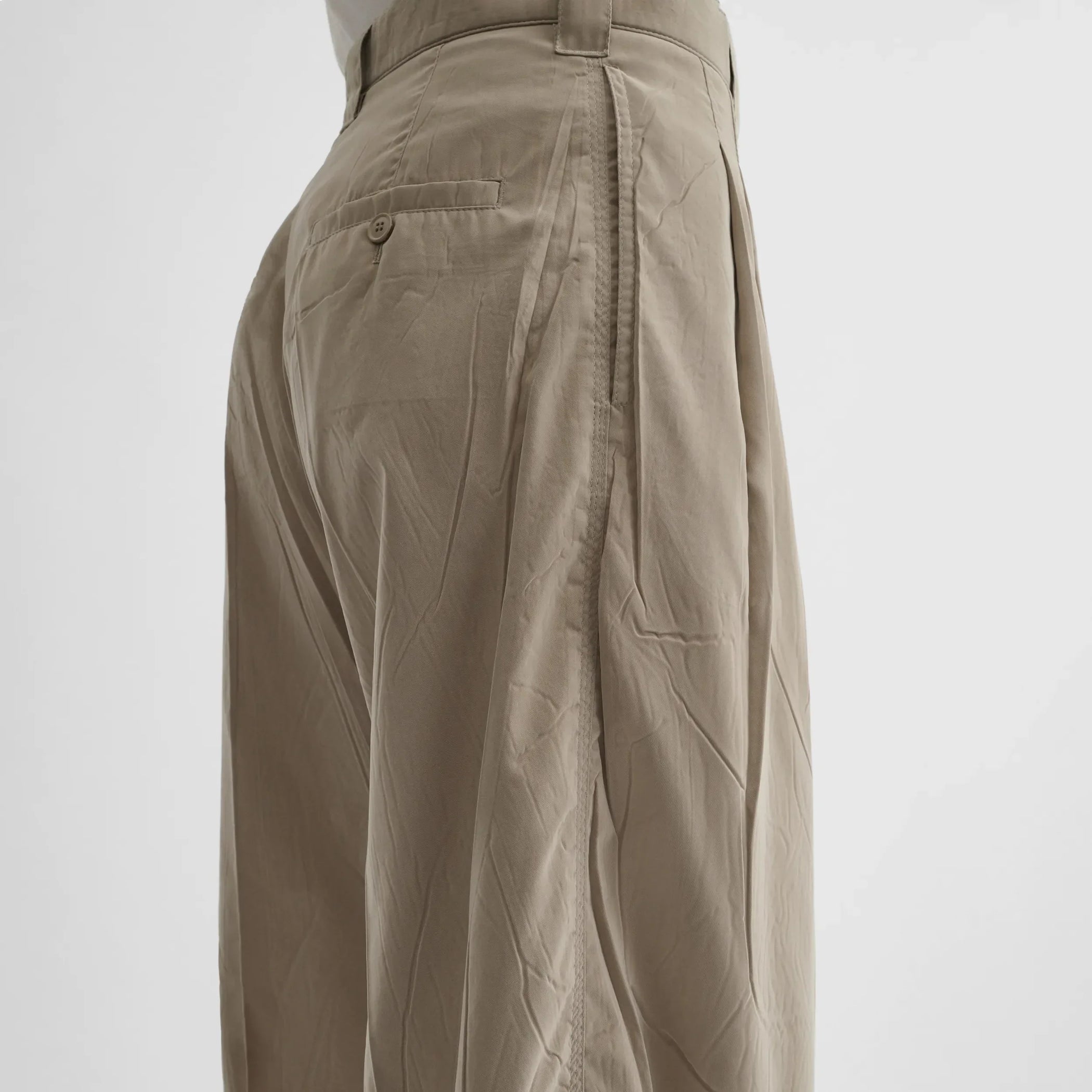 Close up detail view of chino trousers in trench poly-cotton