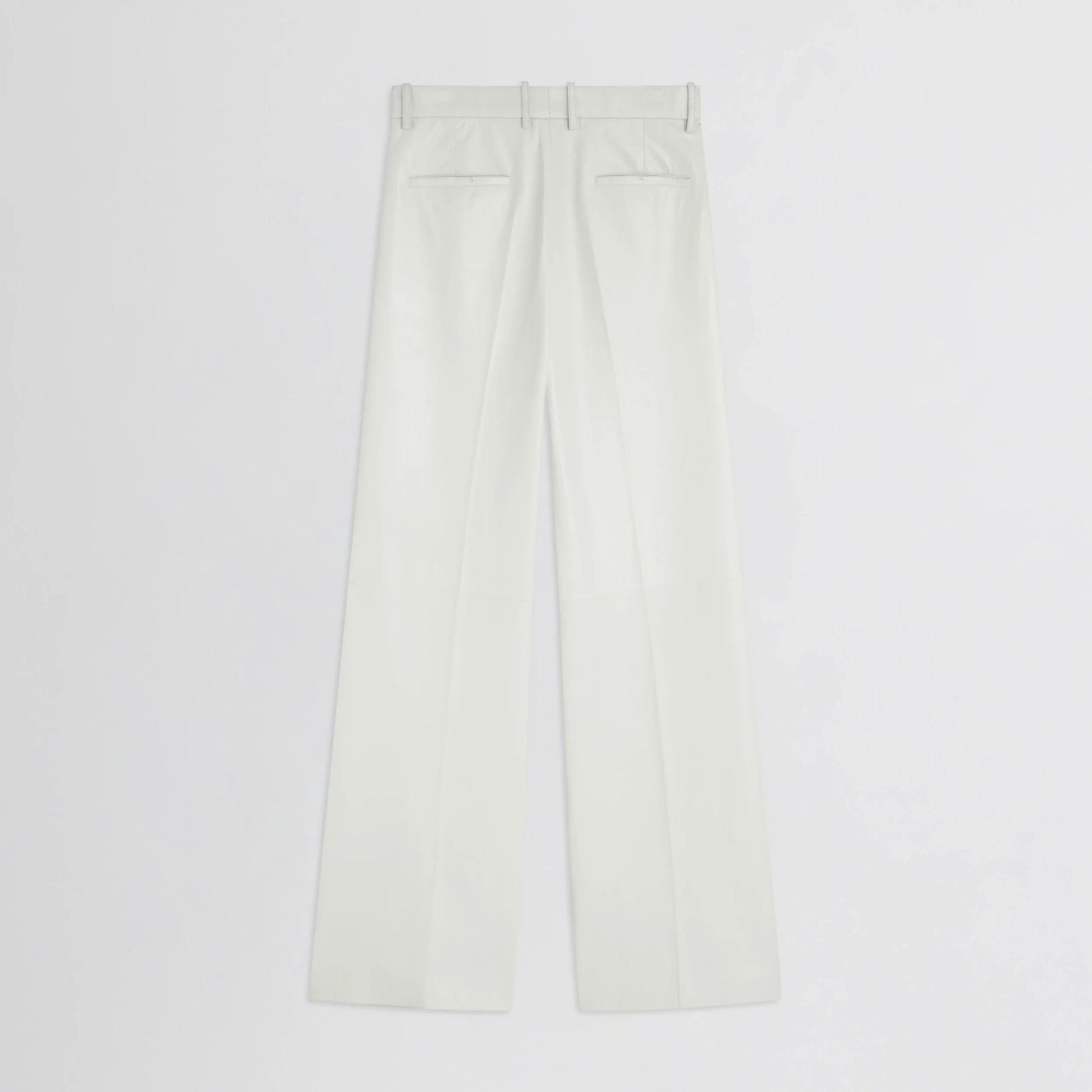 Flat back view of boyish trousers in white leather.