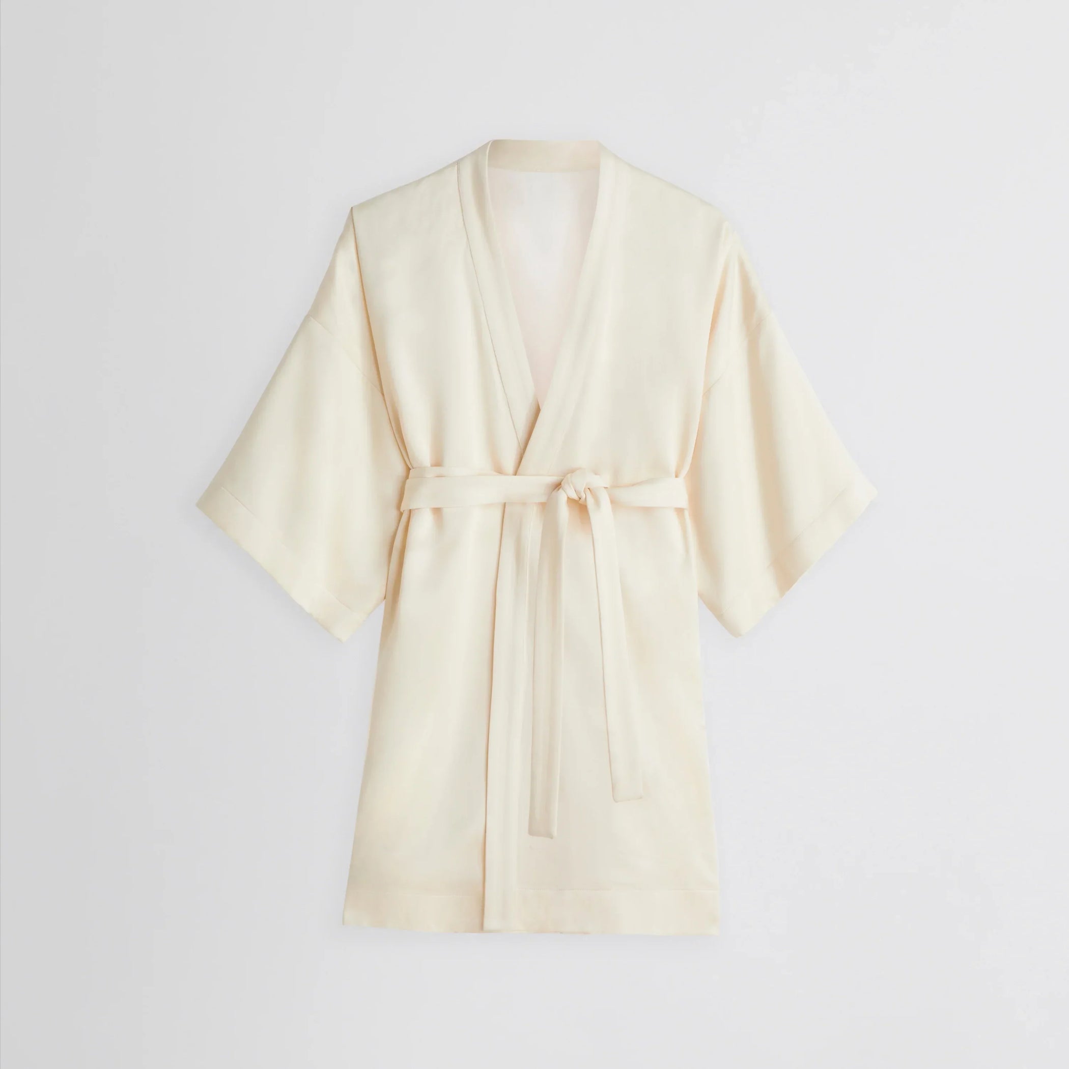 Flat front view of CROPPED ROBE DRESS in cream viscose