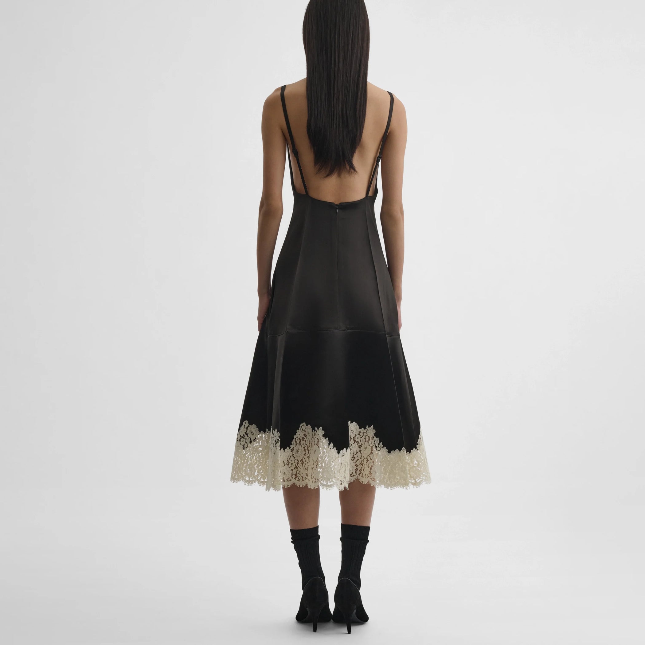 Back view of model wearing the slicked slip in dark khaki
