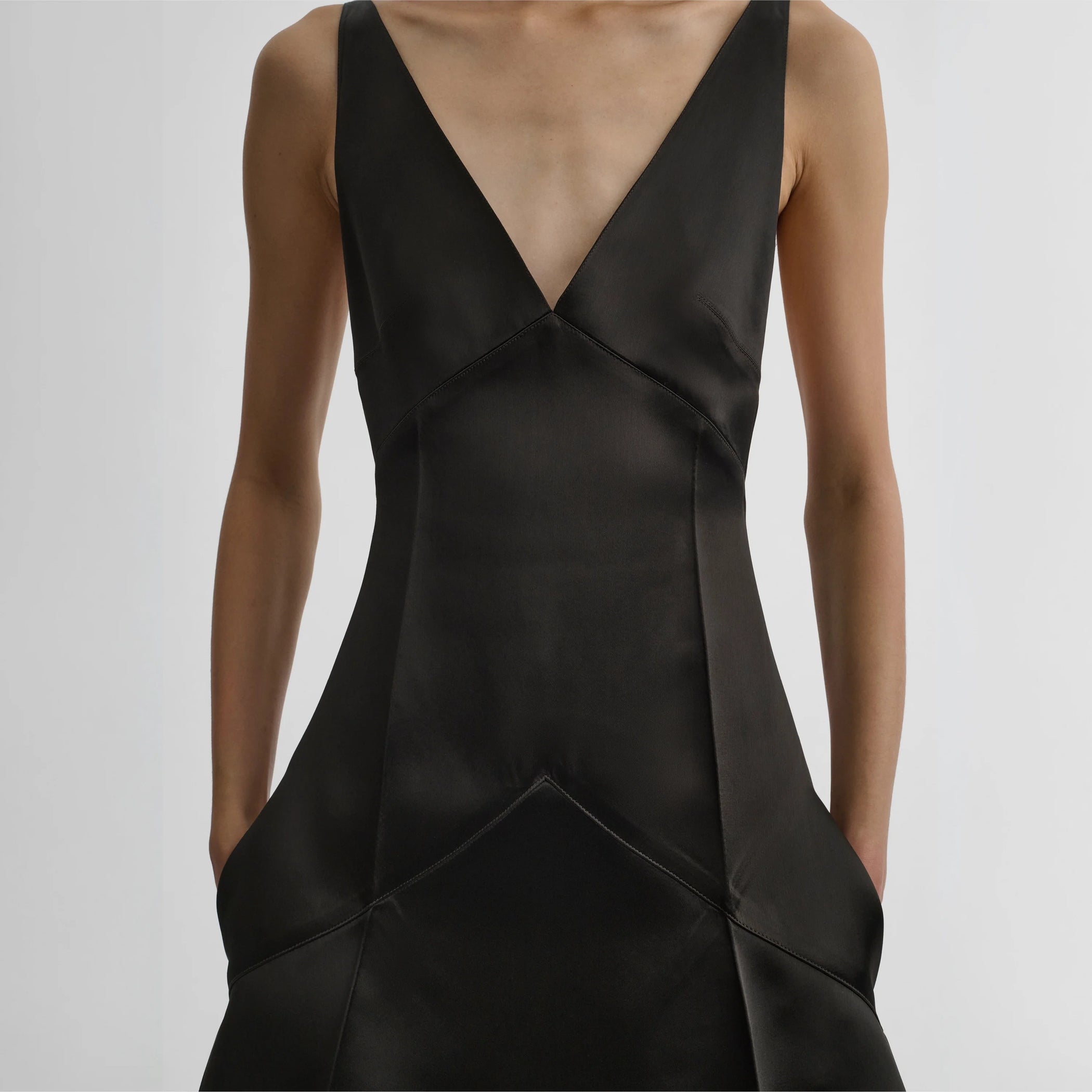Detailed view of model wearing the slicked slip in dark khaki