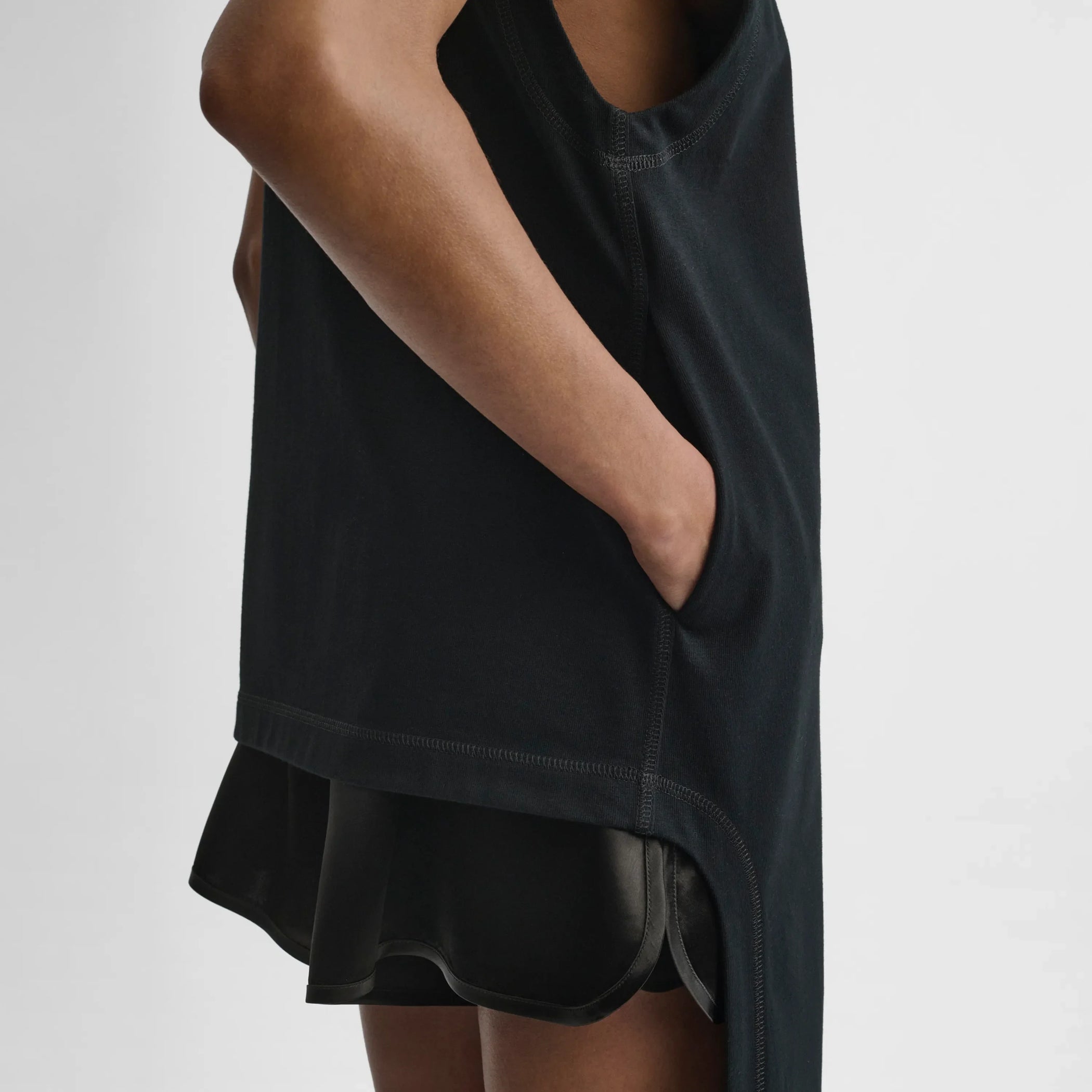 Close up detail view of reversible train tank in black cotton