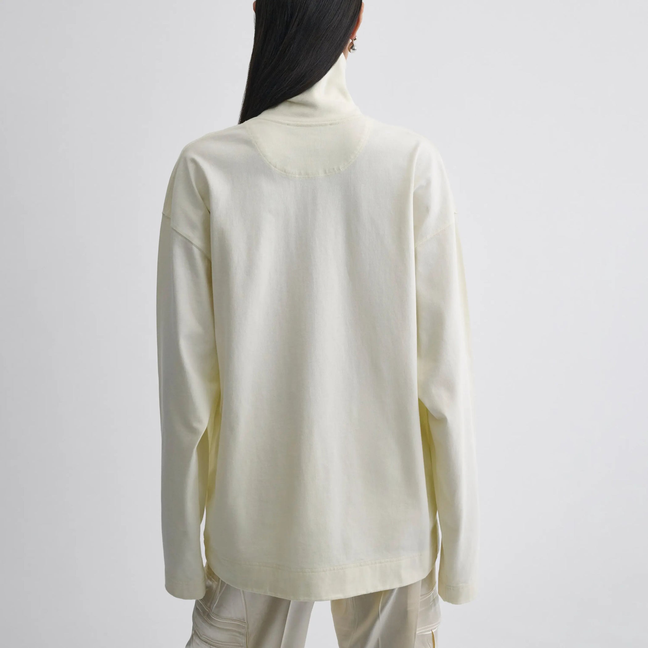 Back view of relaxed long sleeve jersey in cream cotton jersey