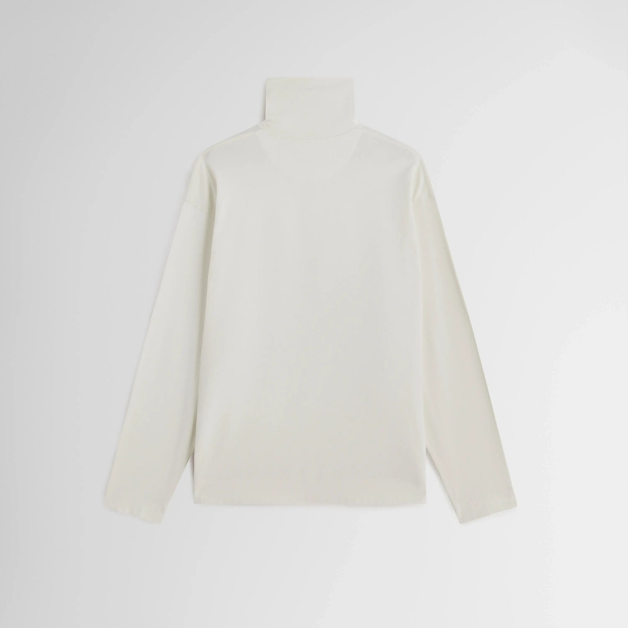 Flat back view of relaxed long sleeve jersey in cream cotton jersey