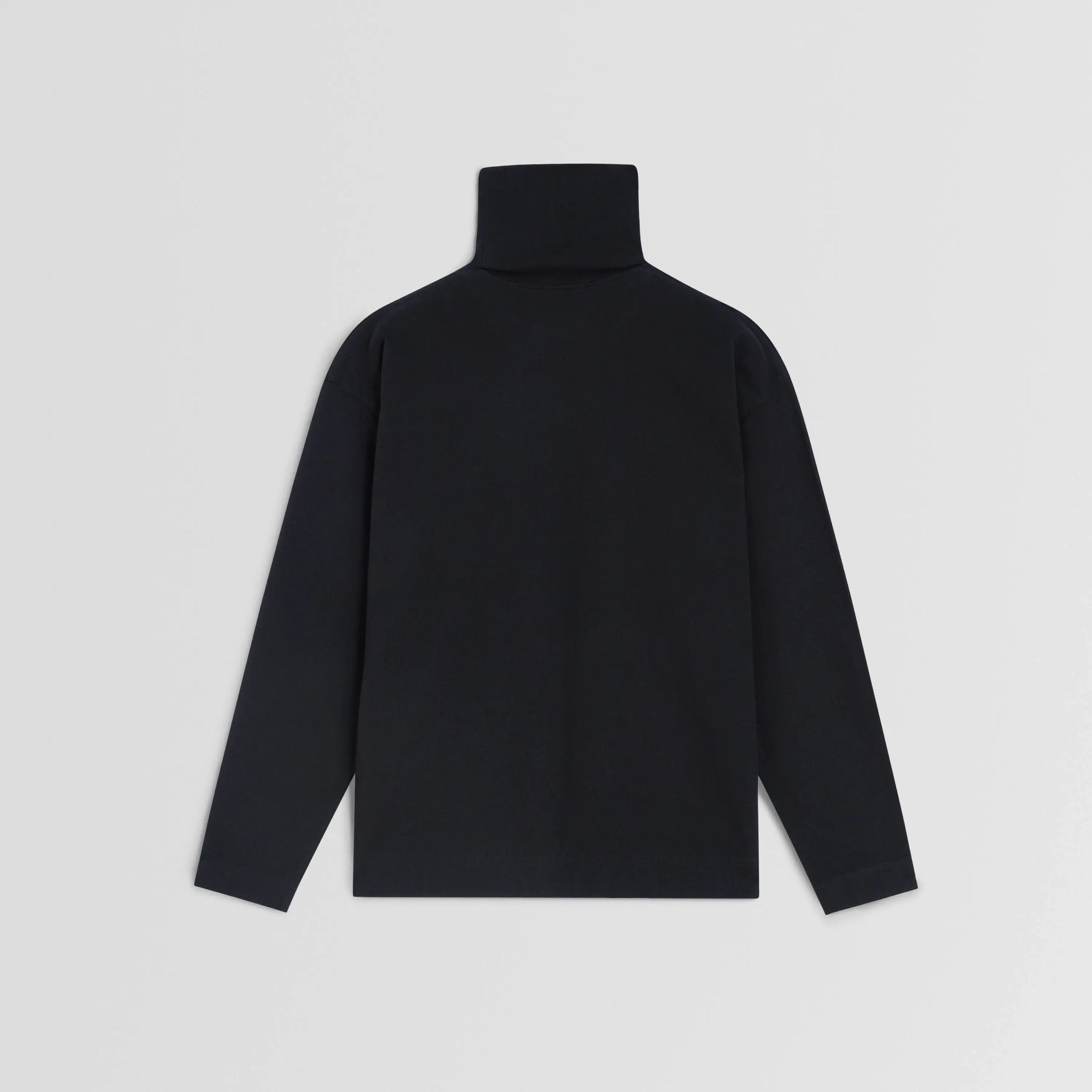 Flat back view of relaxed long sleeve jersey in black cotton jersey