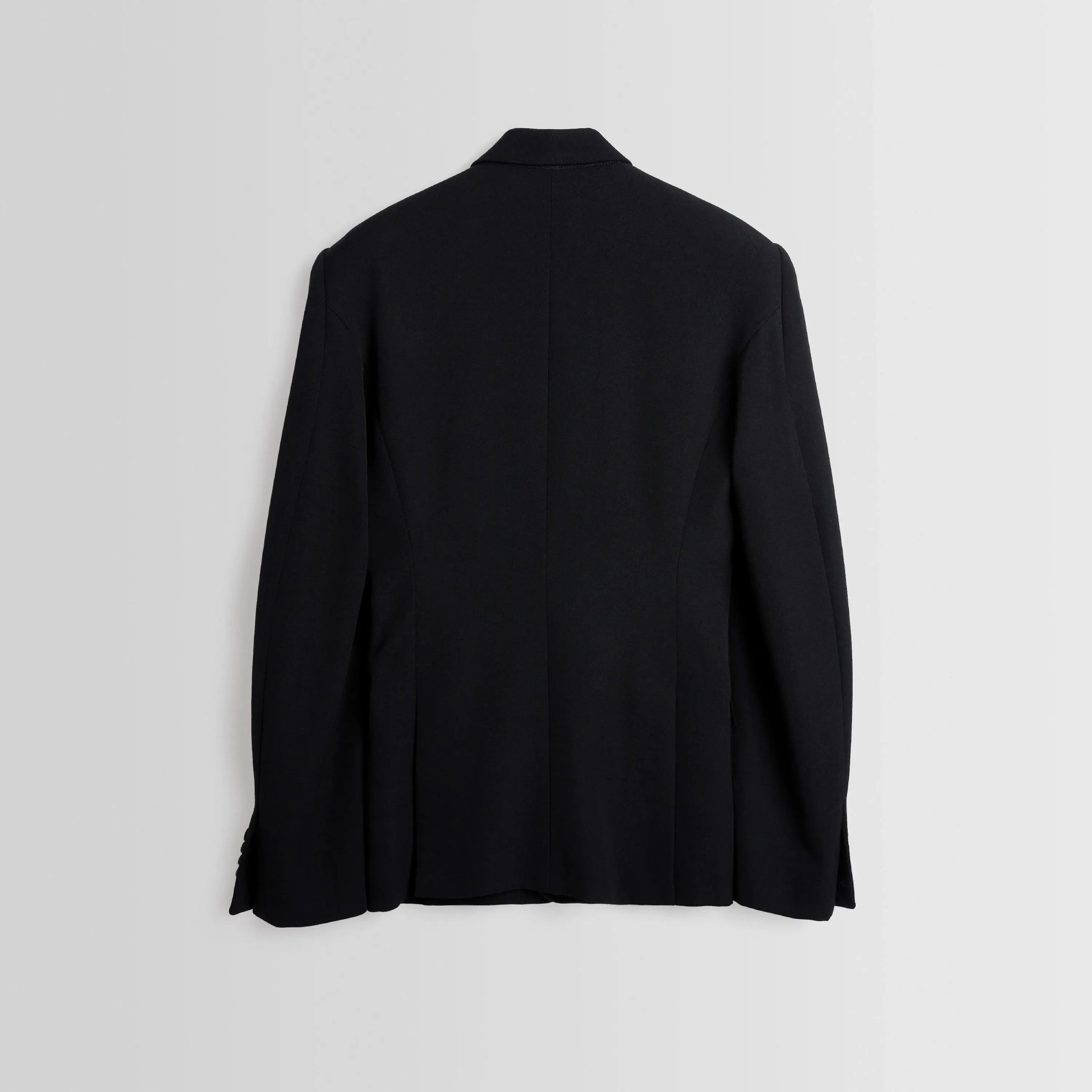 Back front lay of Single Breasted Tailored Jacket in black.