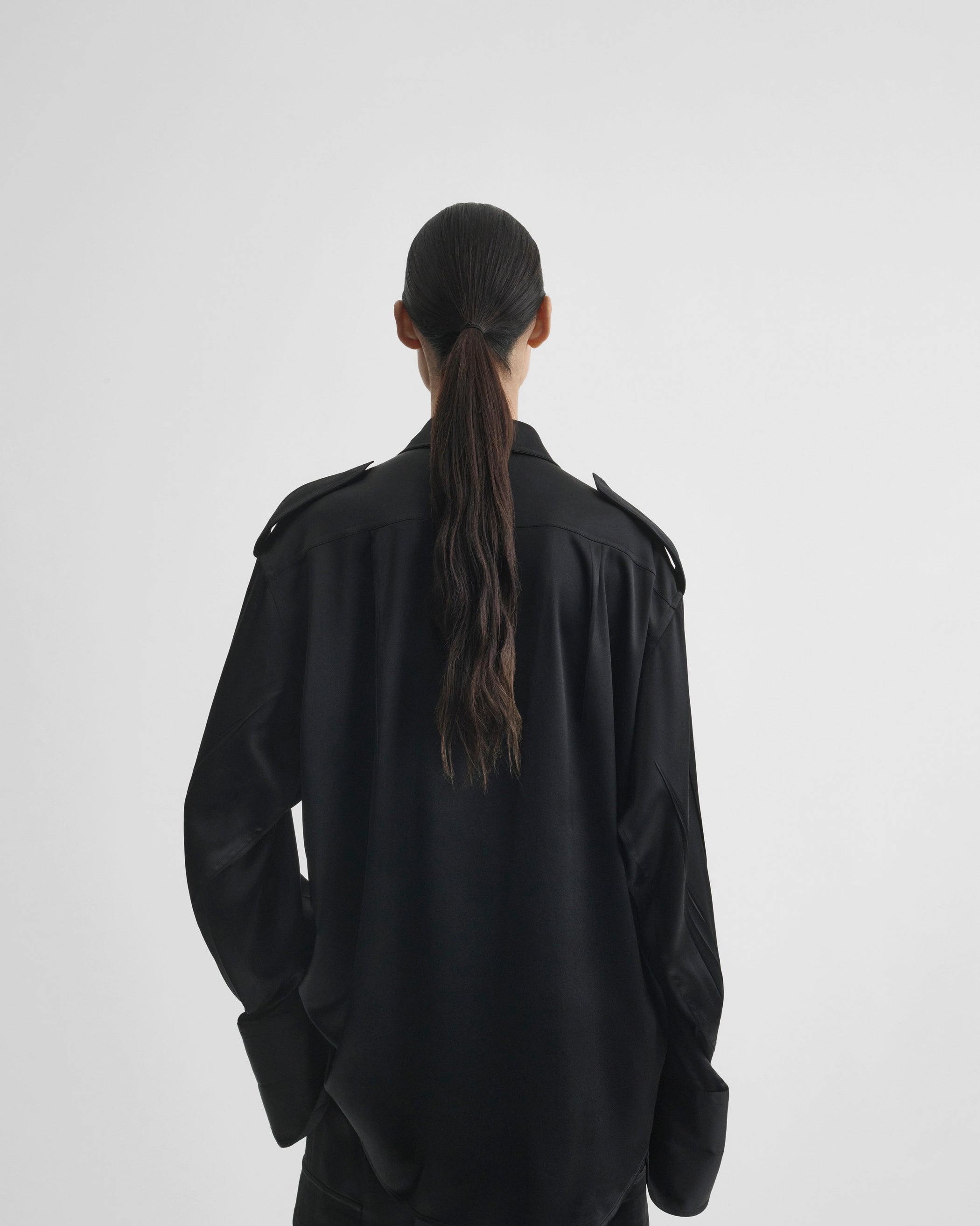 View of liquid utility shirt  in black silk satin