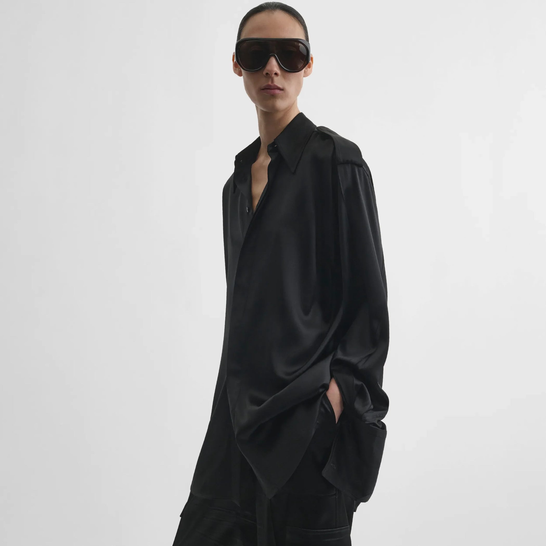 Side model view of liquid utility shirt in black silk satin