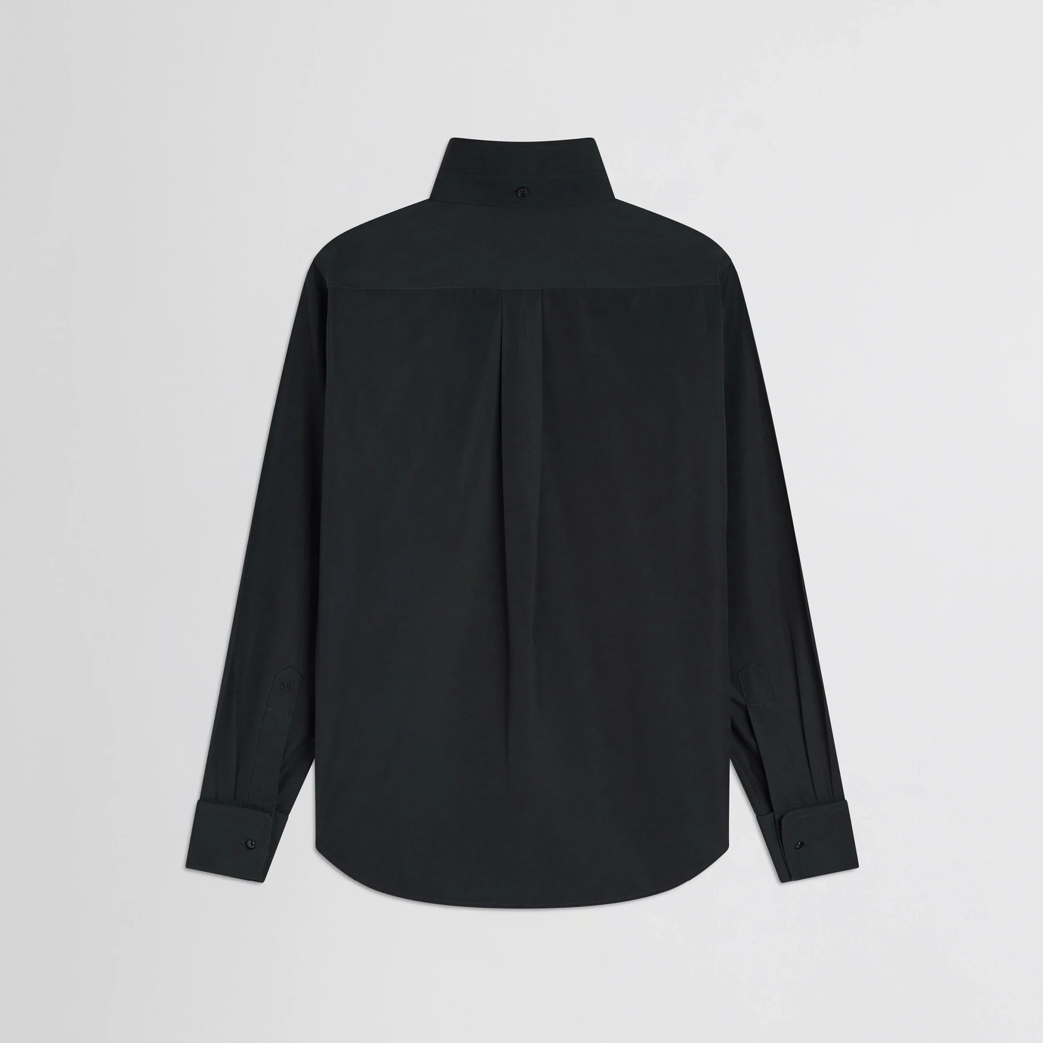 Flat back view of tuxedo shirt in black cotton.